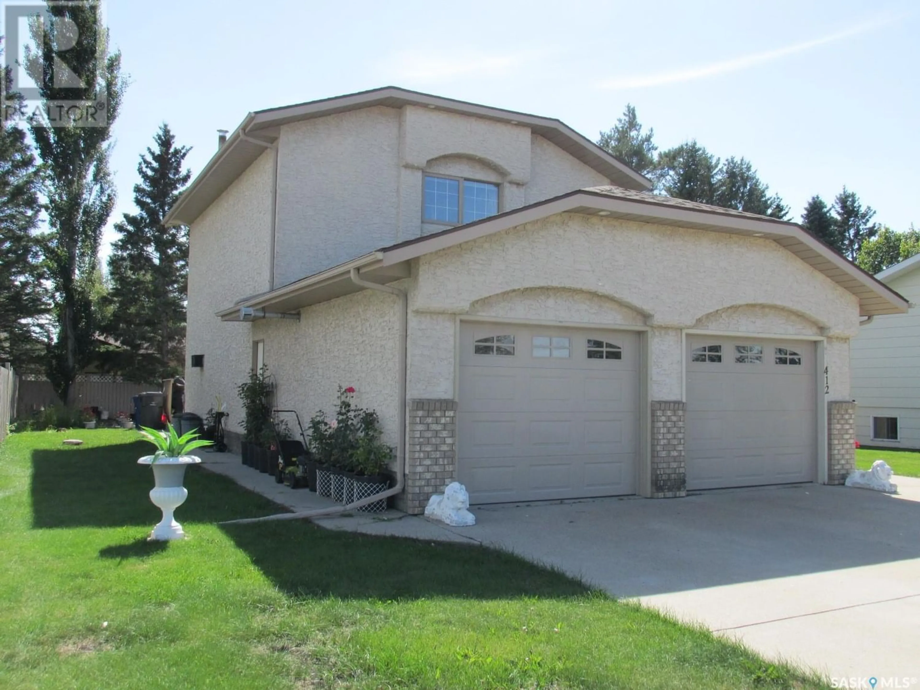 Frontside or backside of a home for 412 9th AVENUE E, Nipawin Saskatchewan S0E1E0