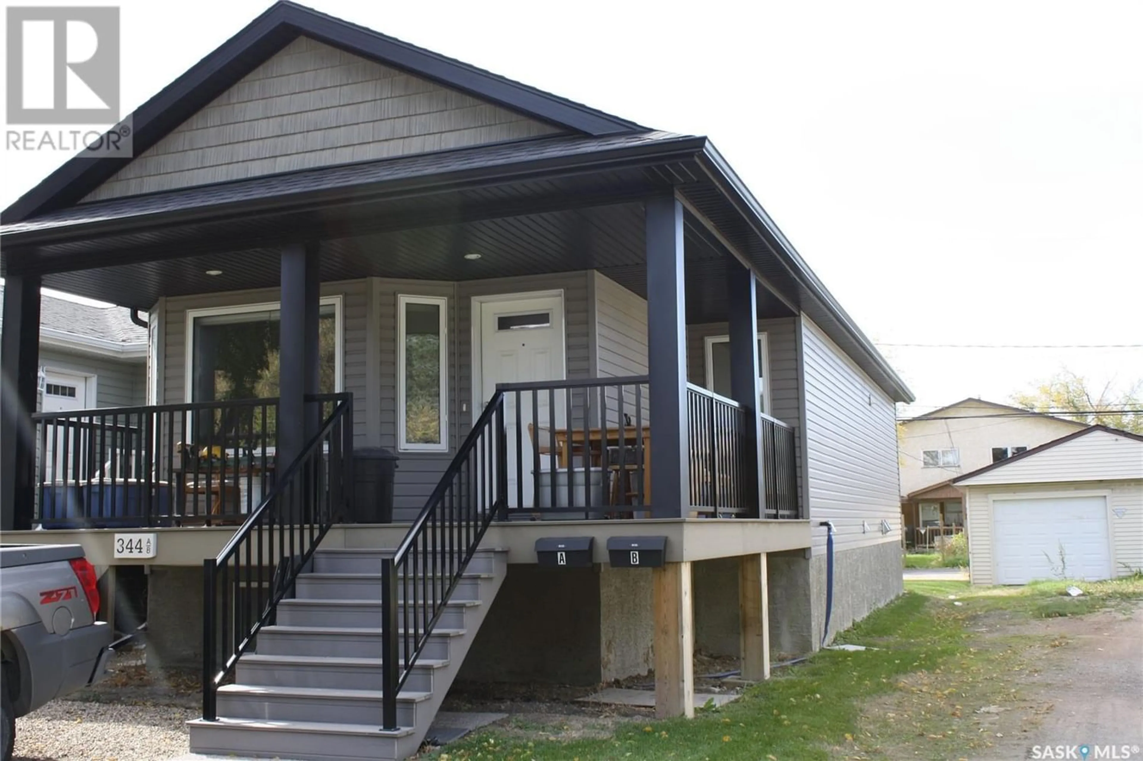 Home with vinyl exterior material for 344 Smith STREET, Regina Saskatchewan S4R2K9