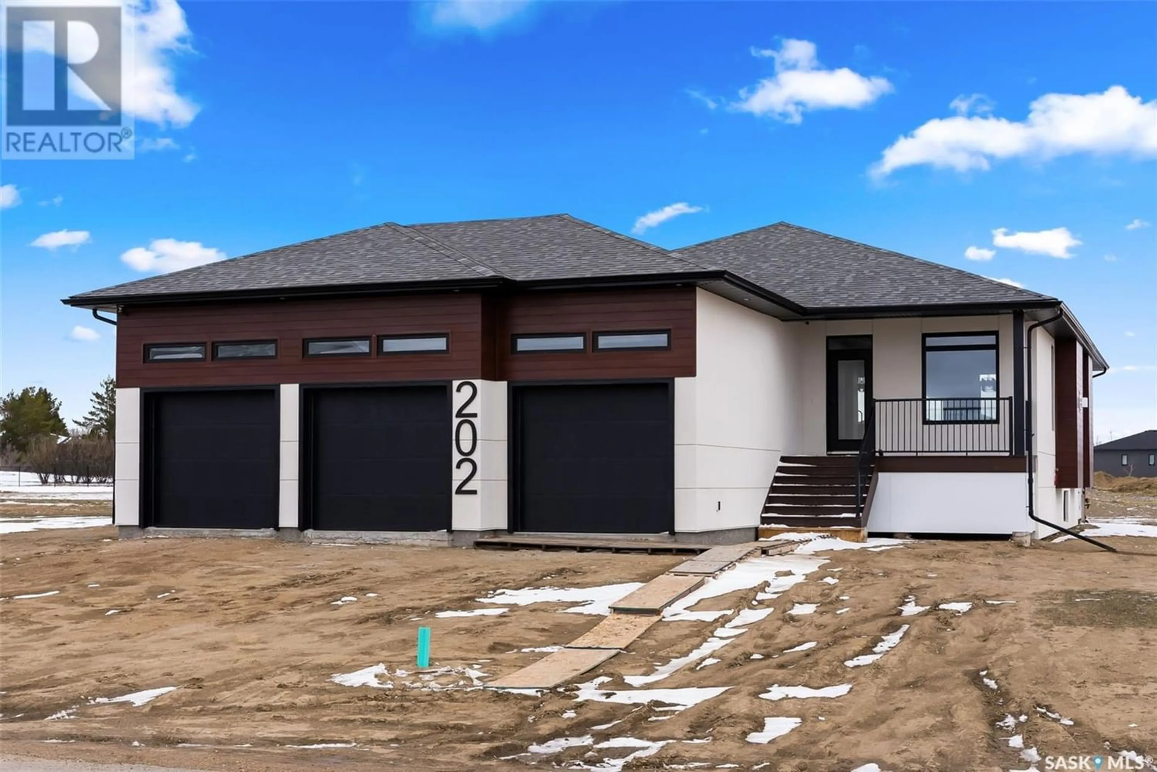 Frontside or backside of a home for 202 Fairway ROAD, Emerald Park Saskatchewan S4L1C8