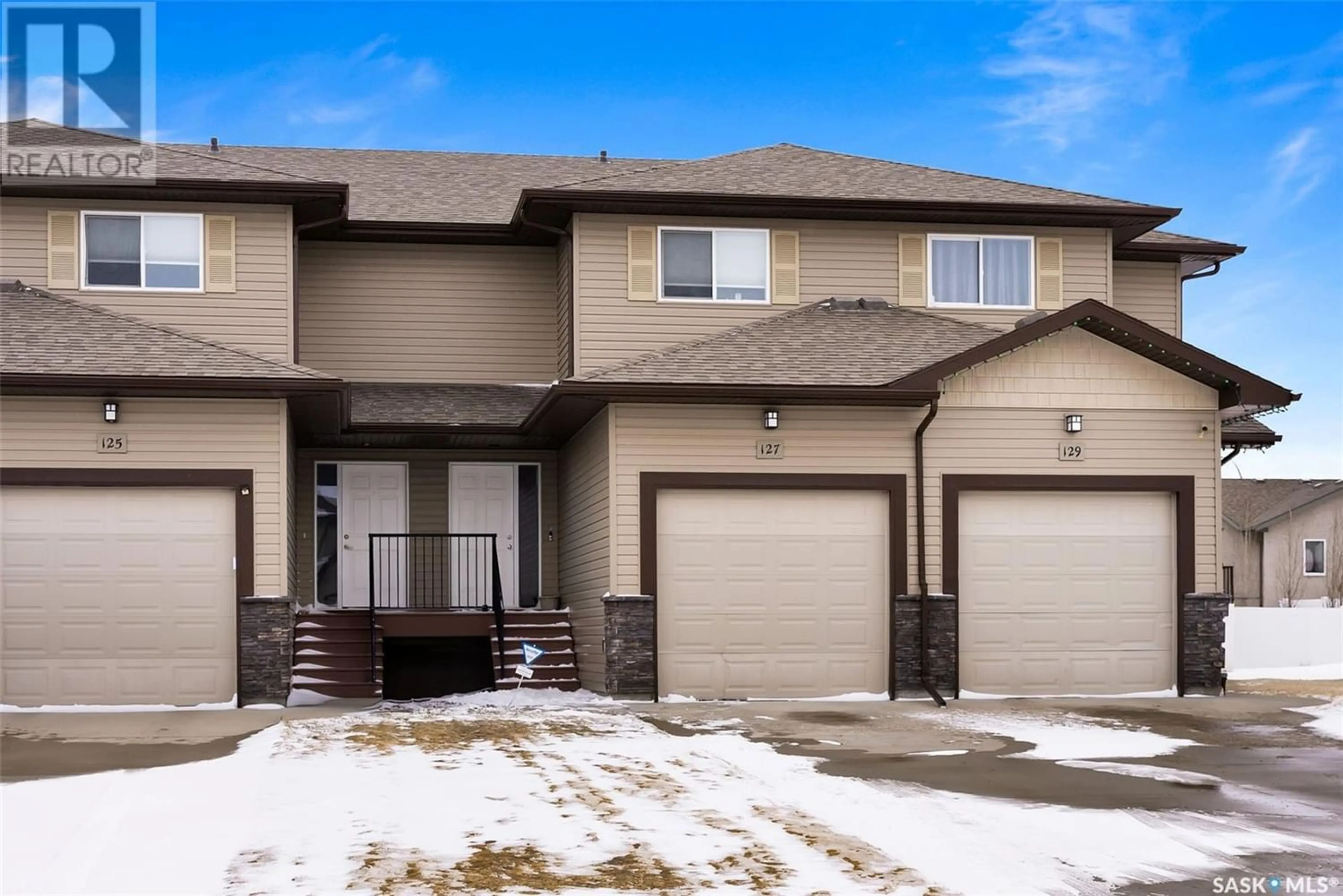 A pic from exterior of the house or condo for 127 PLAINS CIRCLE, Pilot Butte Saskatchewan S0G3Z0