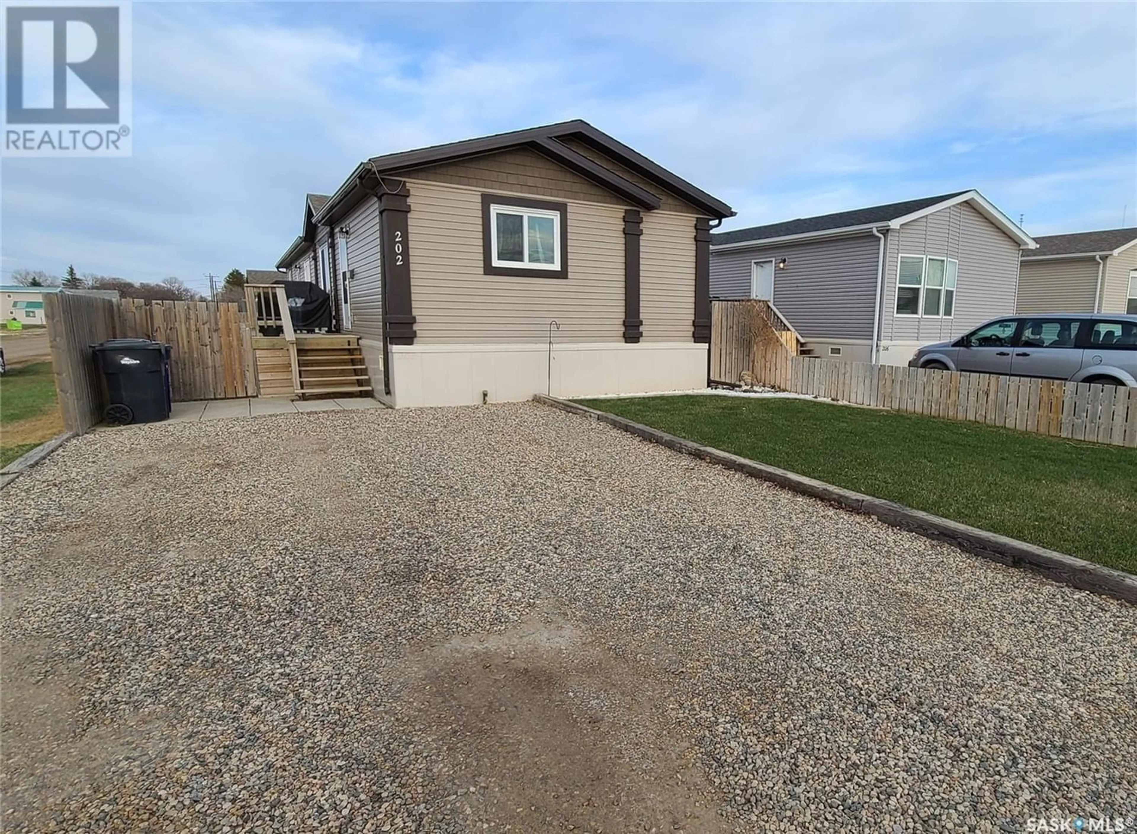 Frontside or backside of a home for 202 Brownlee STREET, Weyburn Saskatchewan S4H3P4
