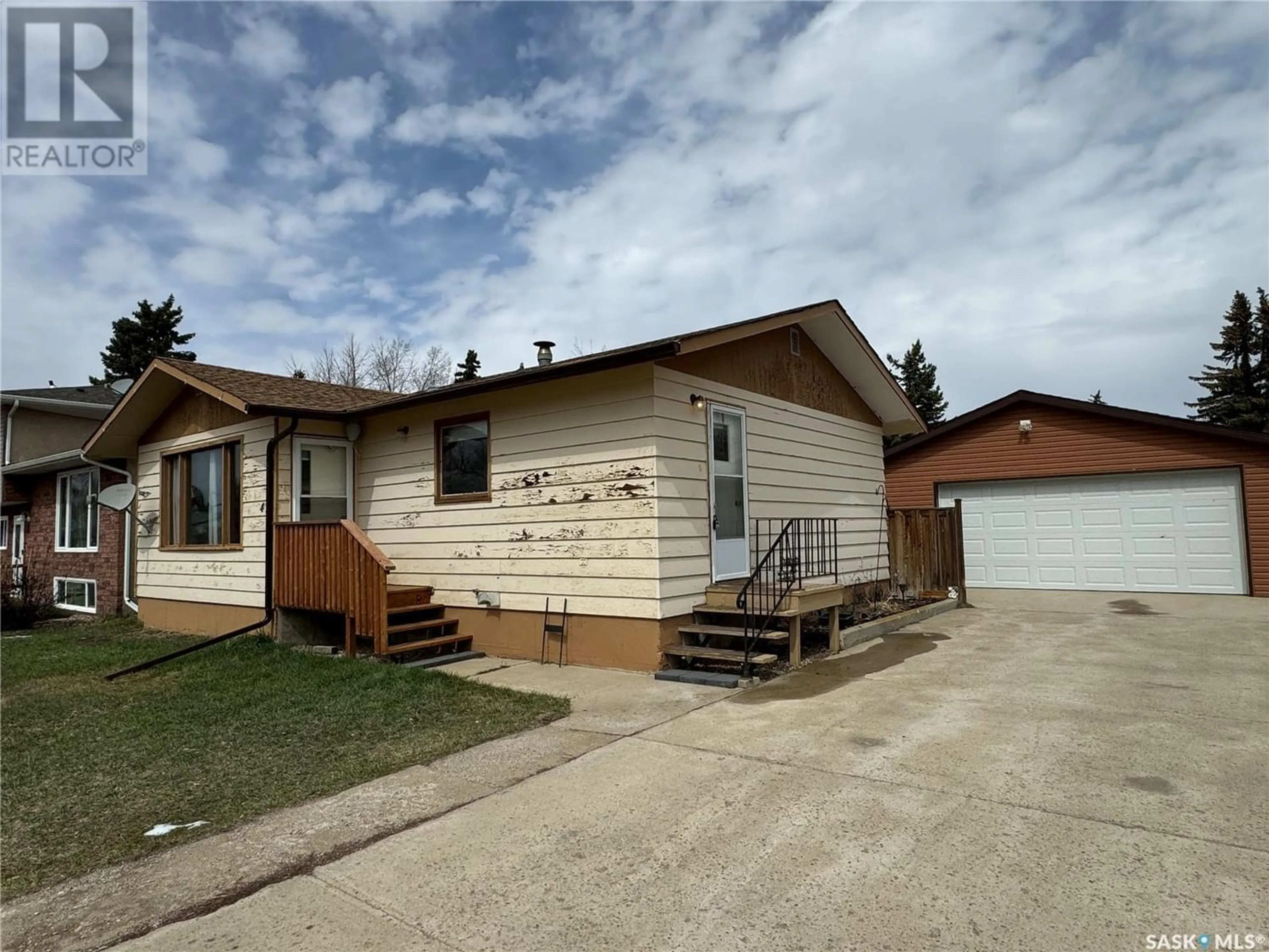 Frontside or backside of a home for 409 5th AVENUE W, Biggar Saskatchewan S0K0M0