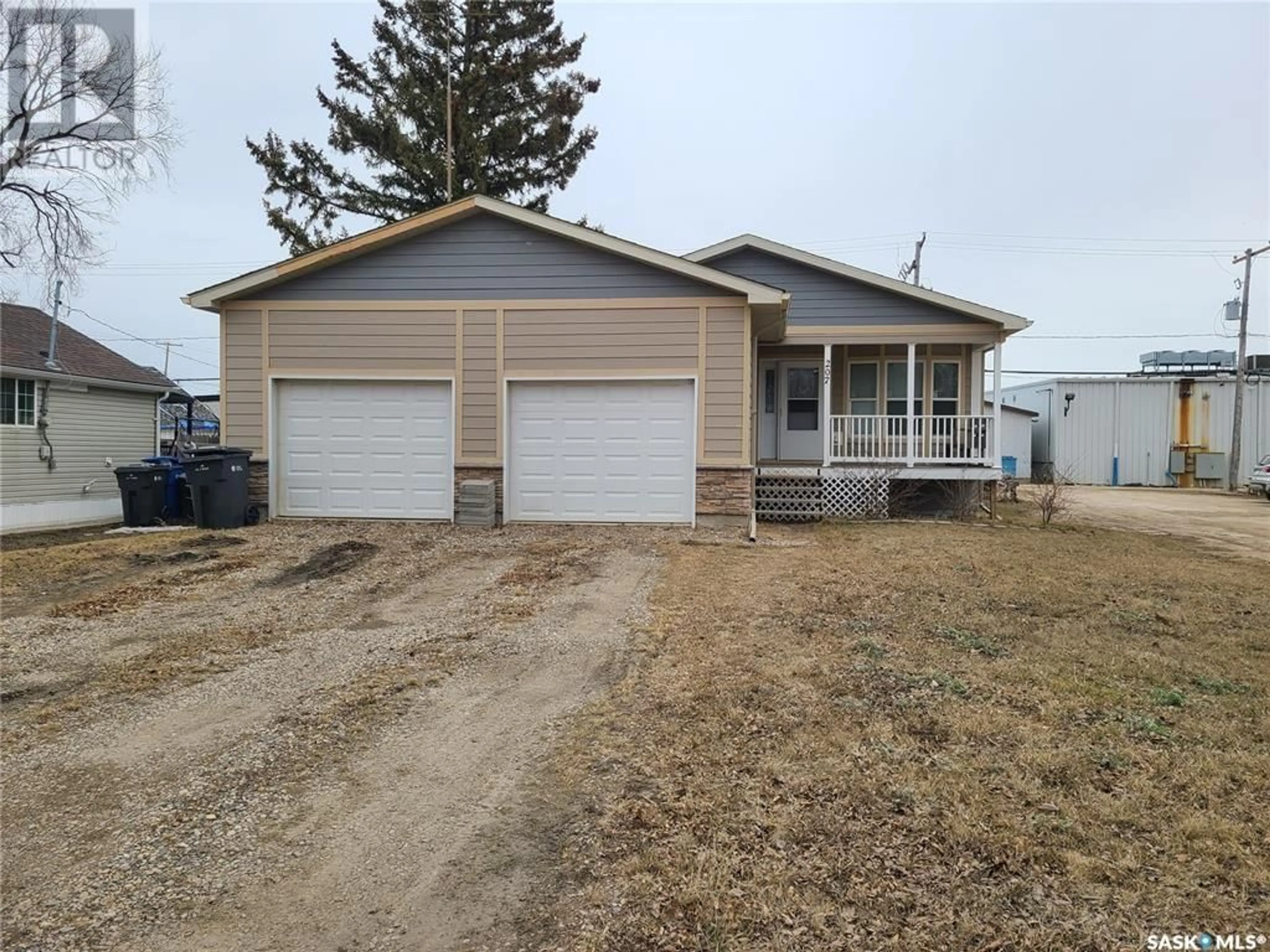 Frontside or backside of a home for 207 W 1st STREET, Carlyle Saskatchewan S0C0R0