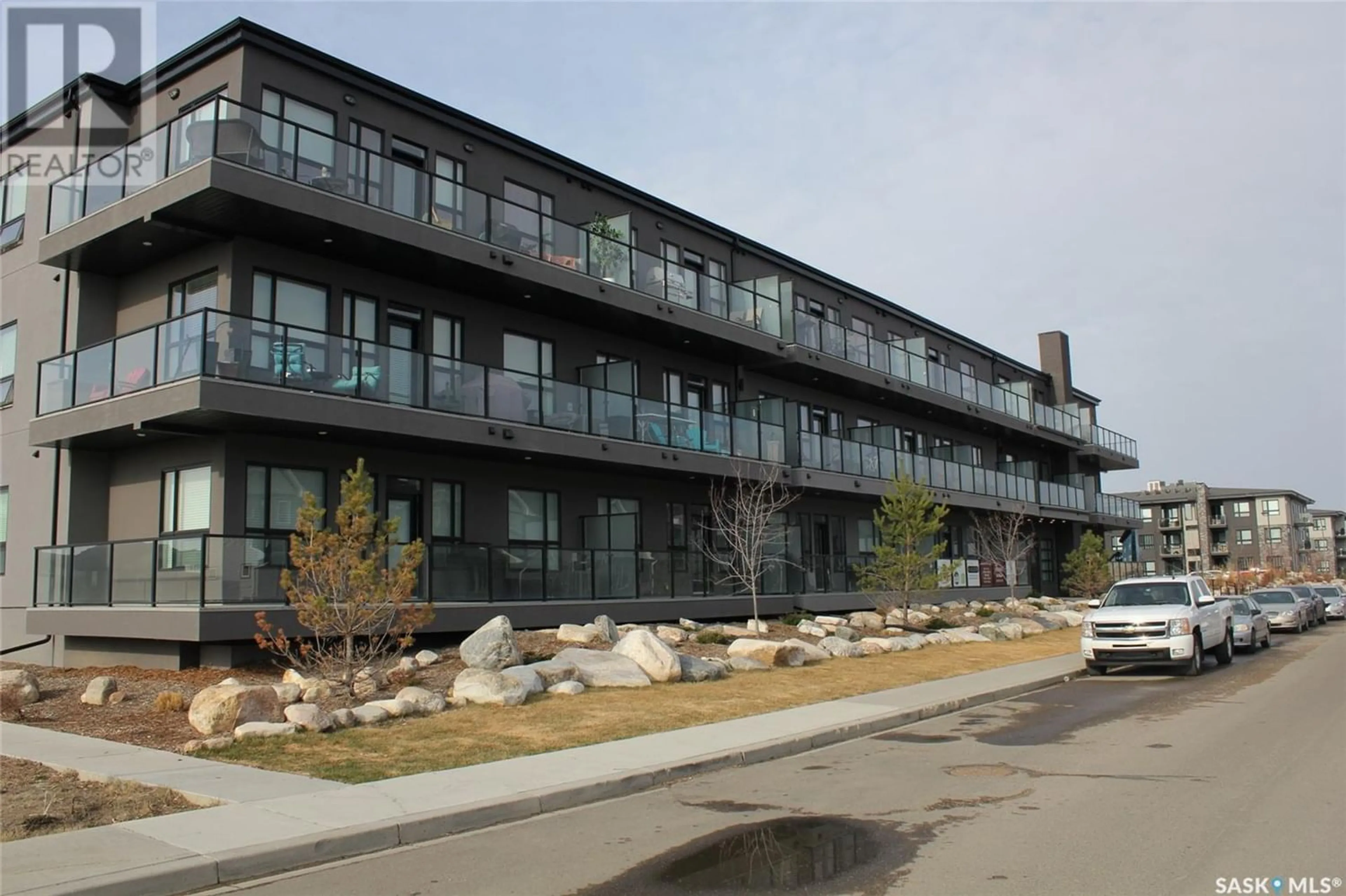 A pic from exterior of the house or condo for 202 415 Maningas BEND, Saskatoon Saskatchewan S7W0T6