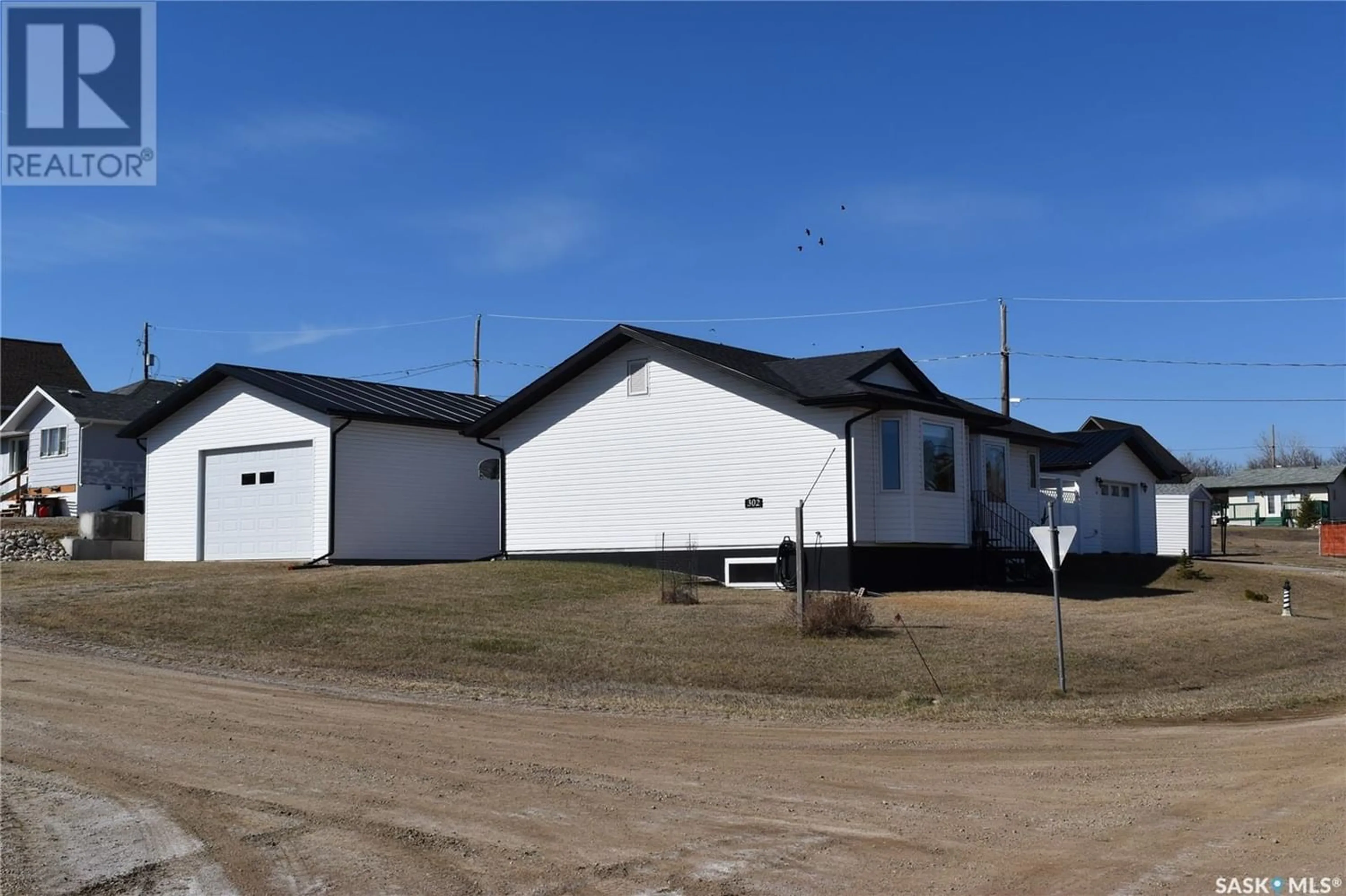 Frontside or backside of a home for 302 Richard STREET, Manitou Beach Saskatchewan S0K4T1