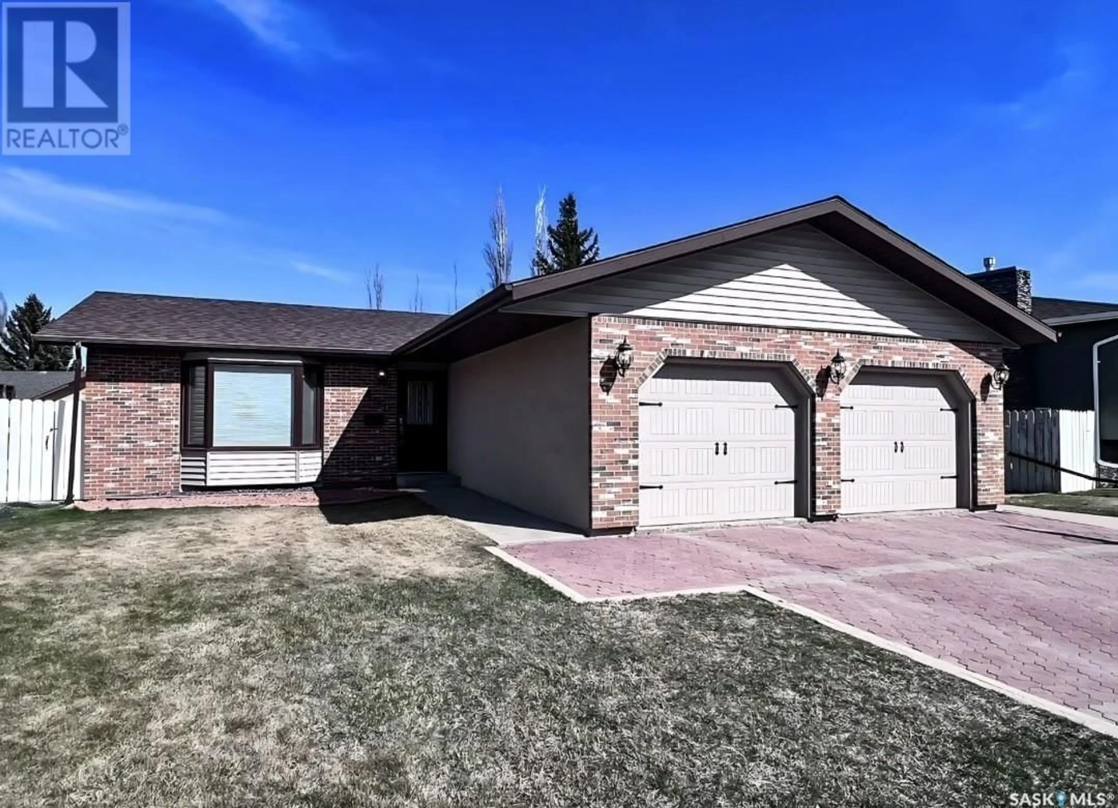 Home with brick exterior material for 451 Curry CRESCENT, Swift Current Saskatchewan S9H4X3