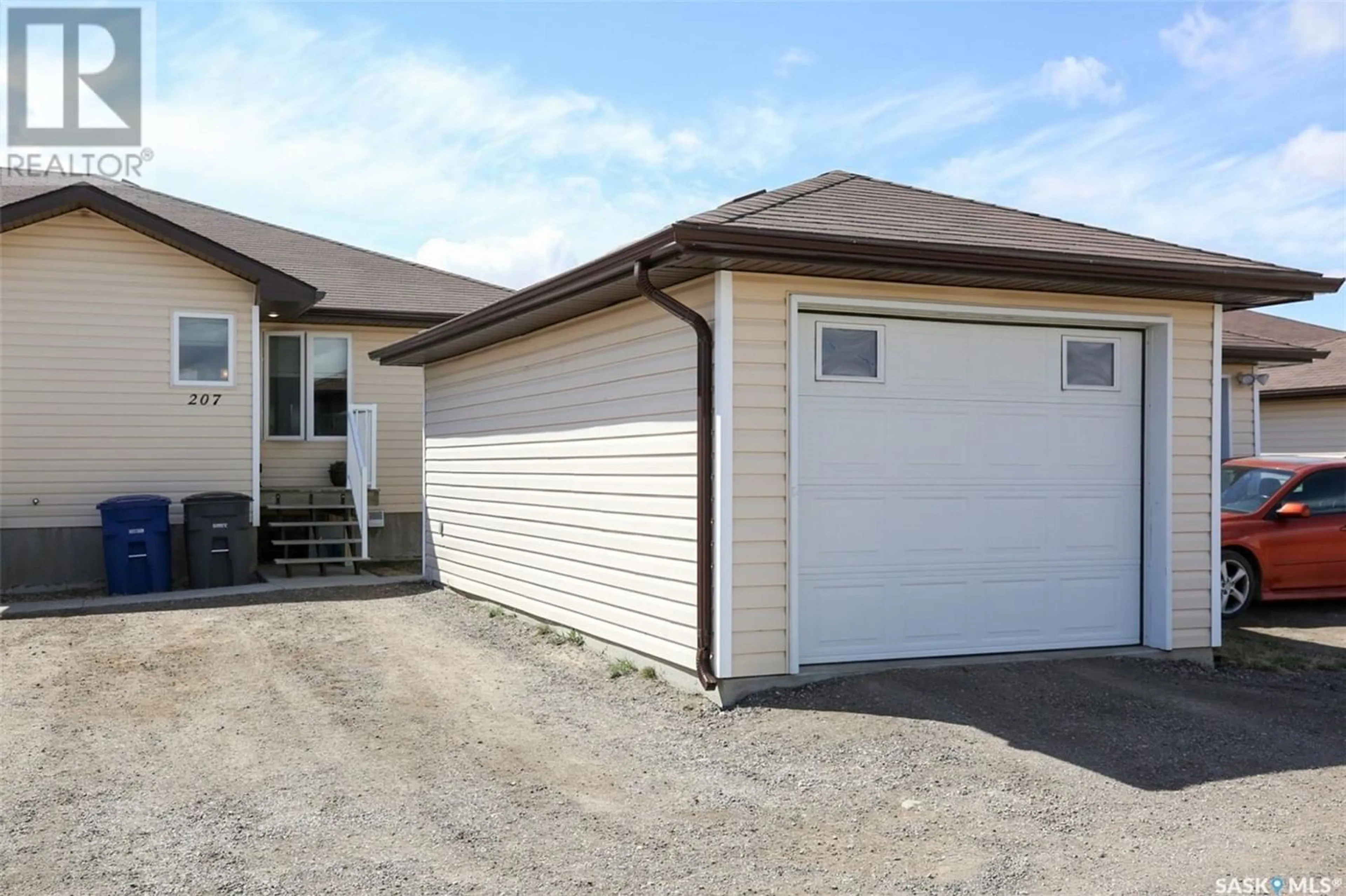 Frontside or backside of a home for 207 South Front STREET, Pense Saskatchewan S0G3W0