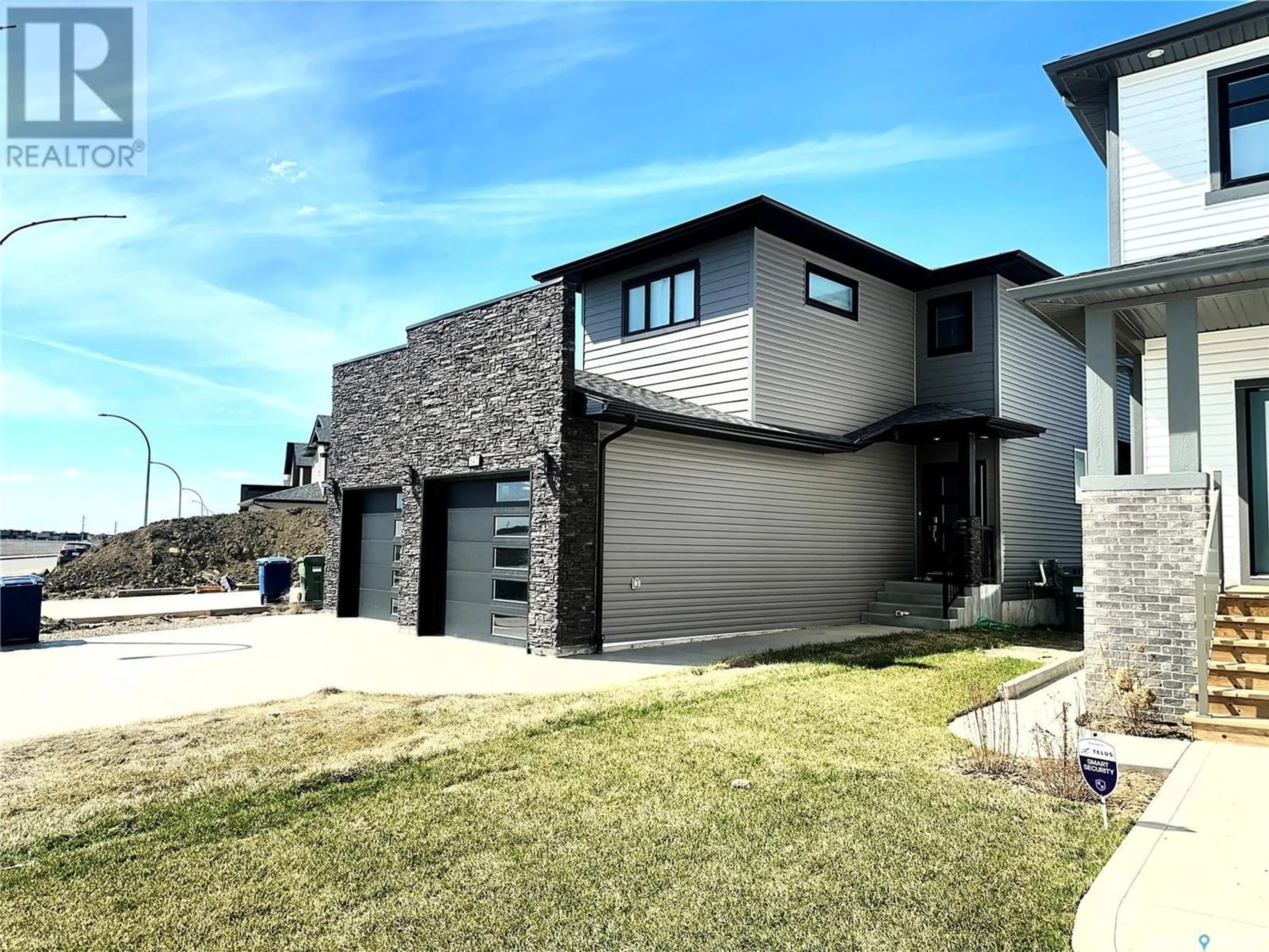Frontside or backside of a home for 547 Kalra STREET, Saskatoon Saskatchewan S7W1E8