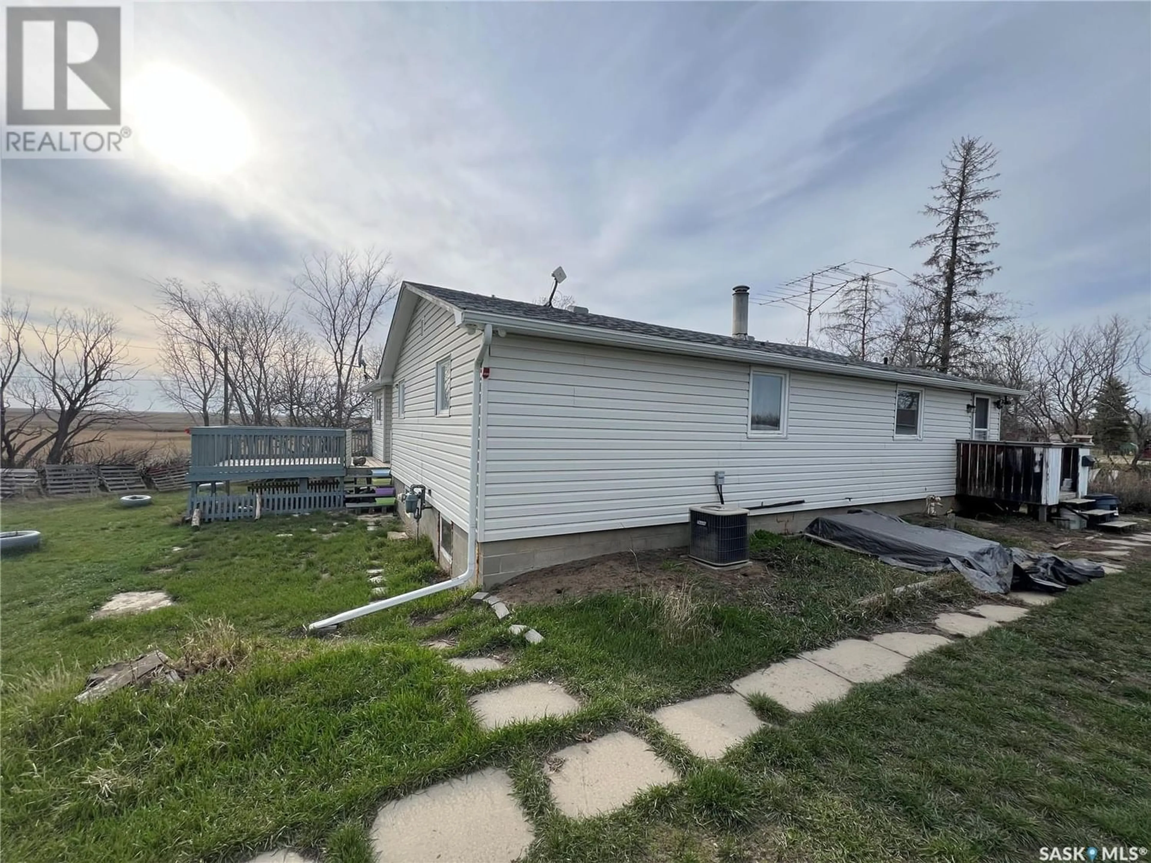 Frontside or backside of a home for 302 East Grid Road, Wiseton Saskatchewan S0L3M0