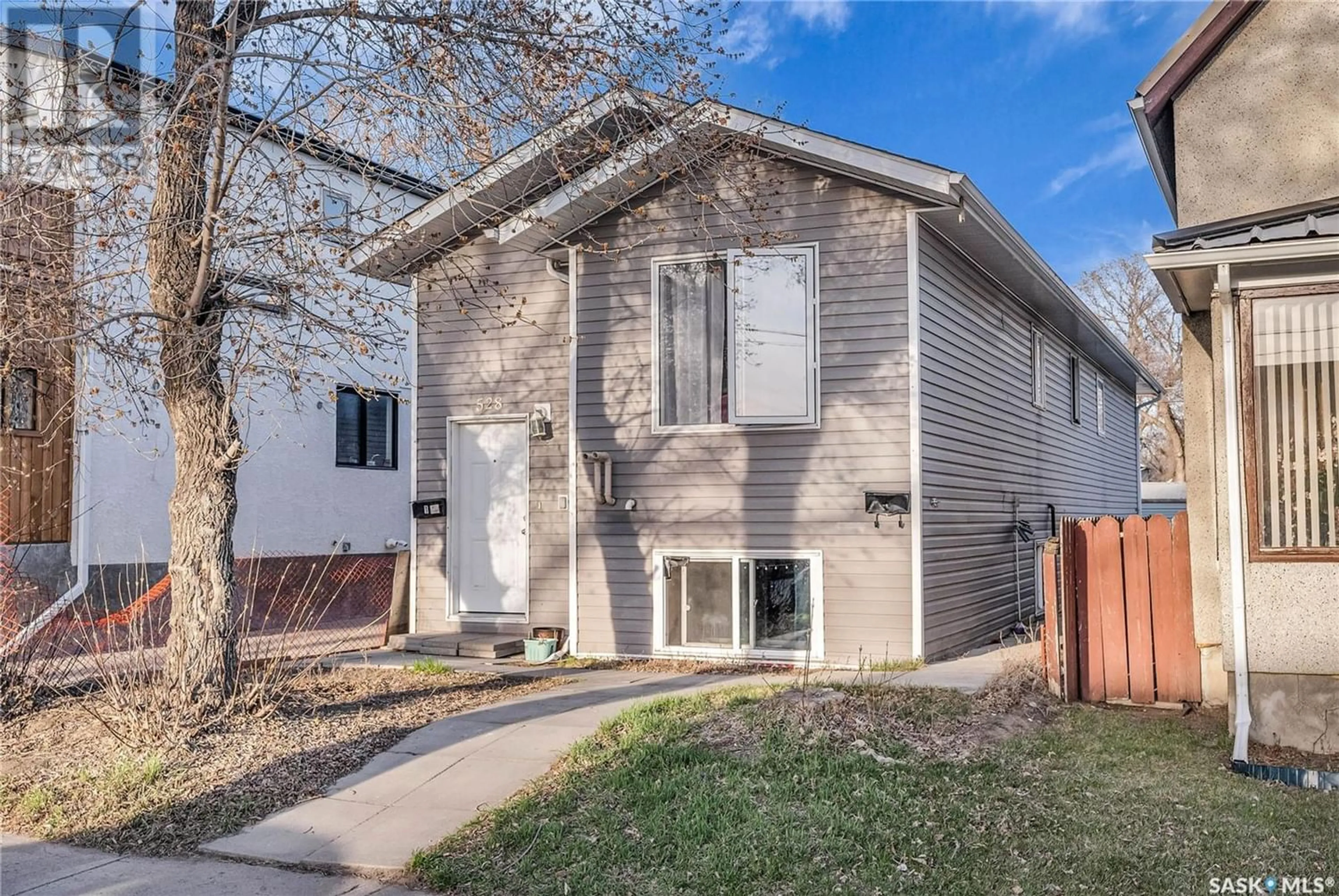 Frontside or backside of a home for 528 H AVENUE S, Saskatoon Saskatchewan S7M1W8
