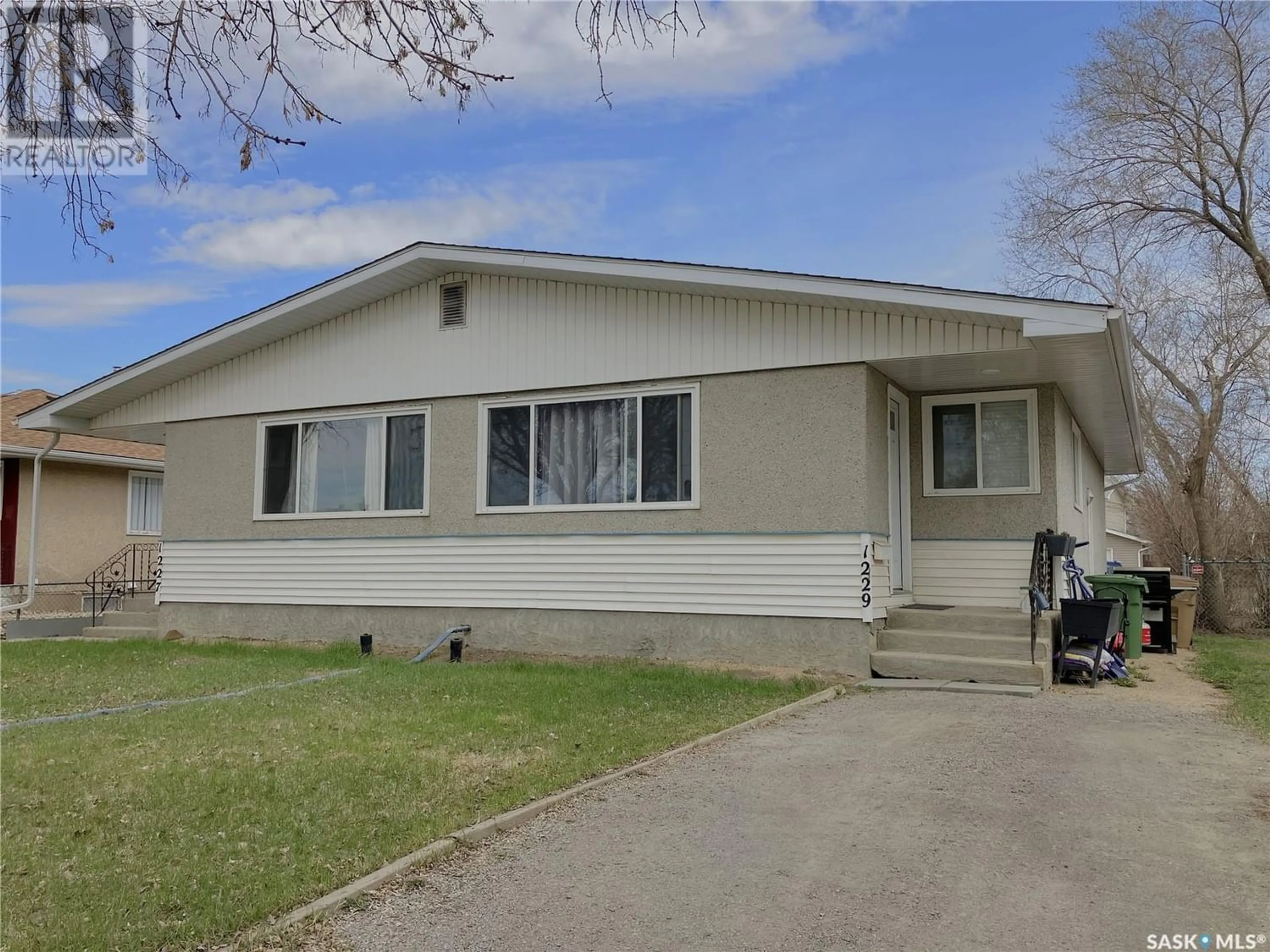 Frontside or backside of a home for 1227-1229 Bond STREET, Regina Saskatchewan S4N1W8
