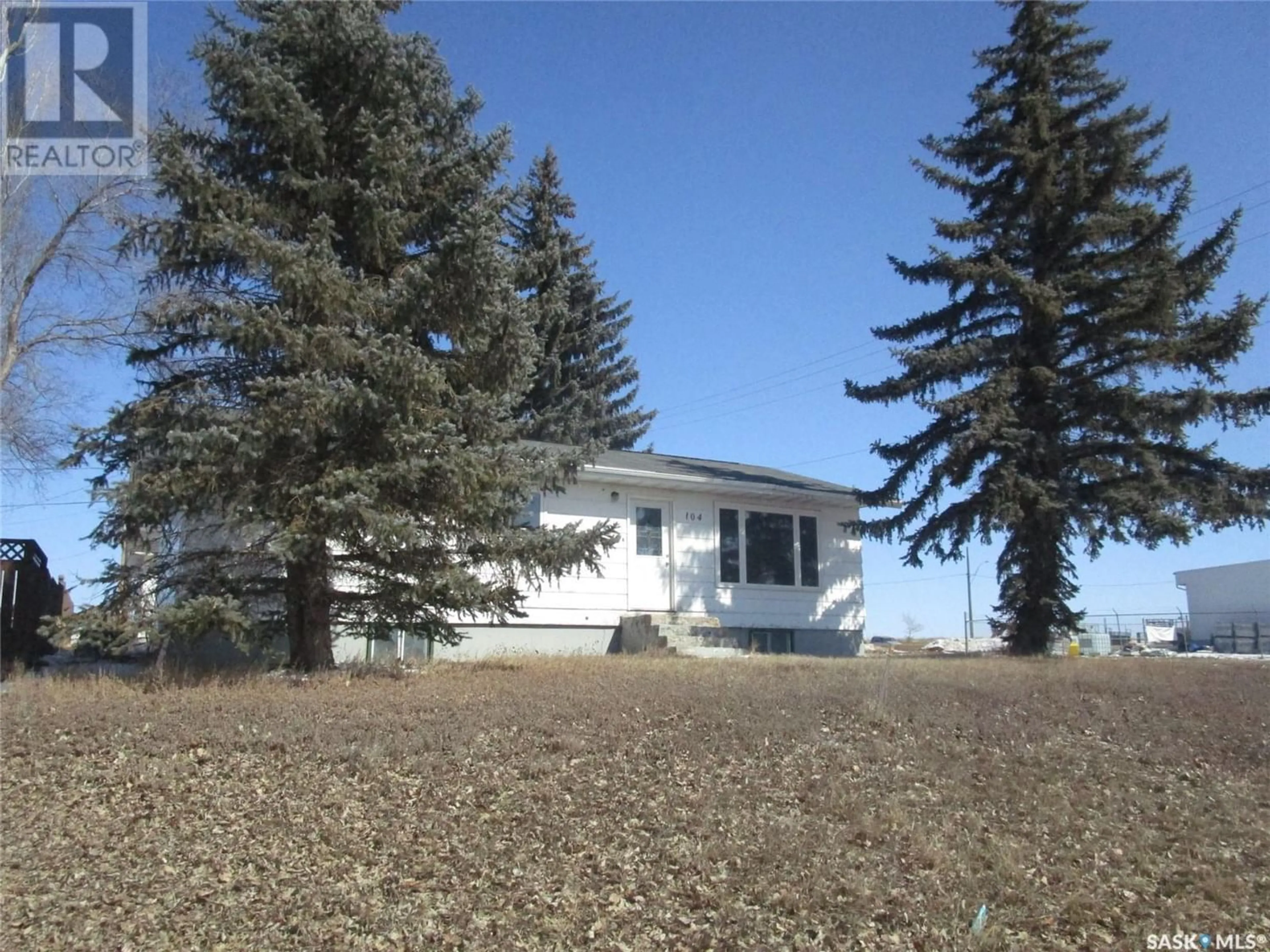 Frontside or backside of a home for 104 Churchill AVENUE, Coronach Saskatchewan S0H0Z0