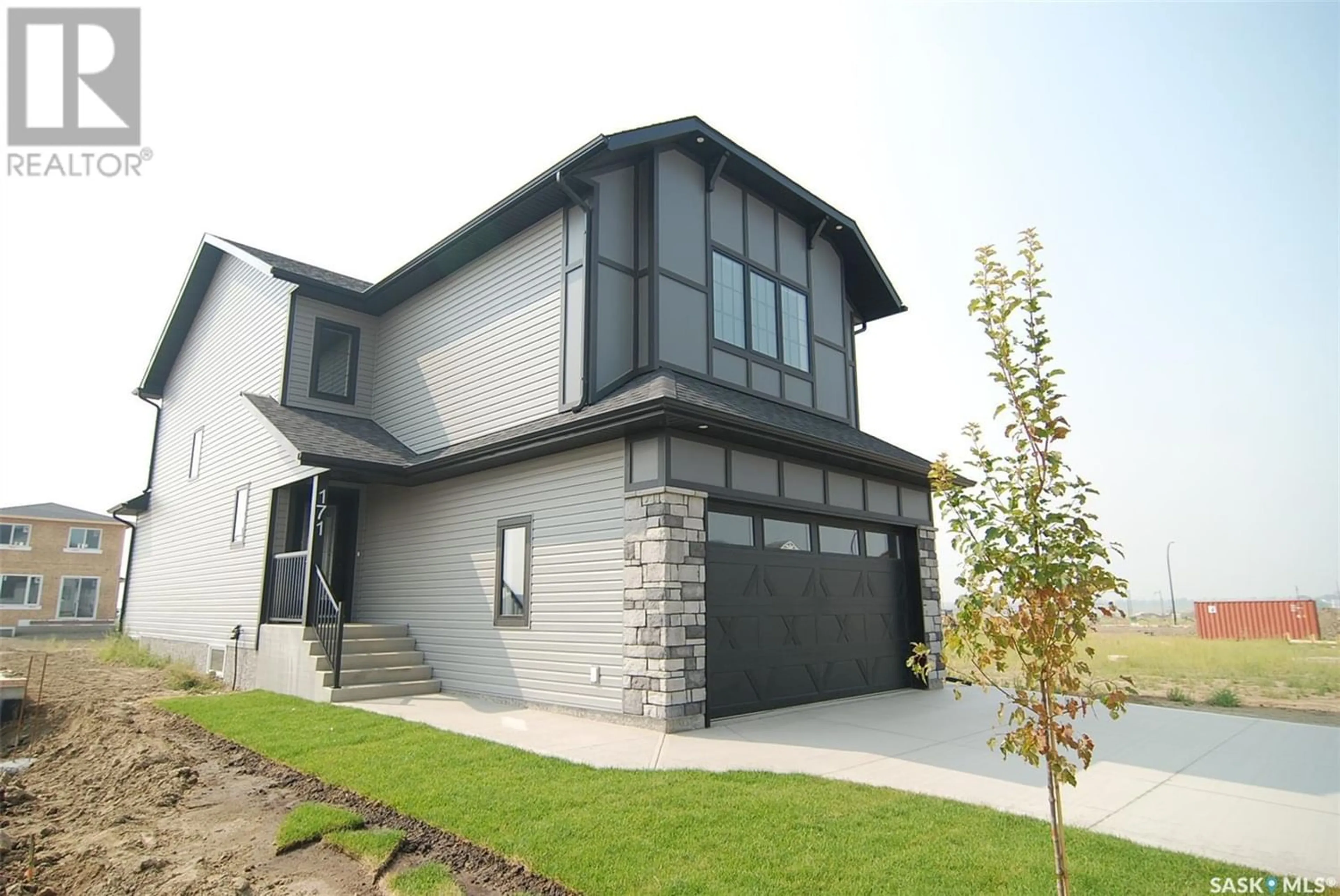 Frontside or backside of a home for 171 Schmeiser LANE, Saskatoon Saskatchewan S7V0N3