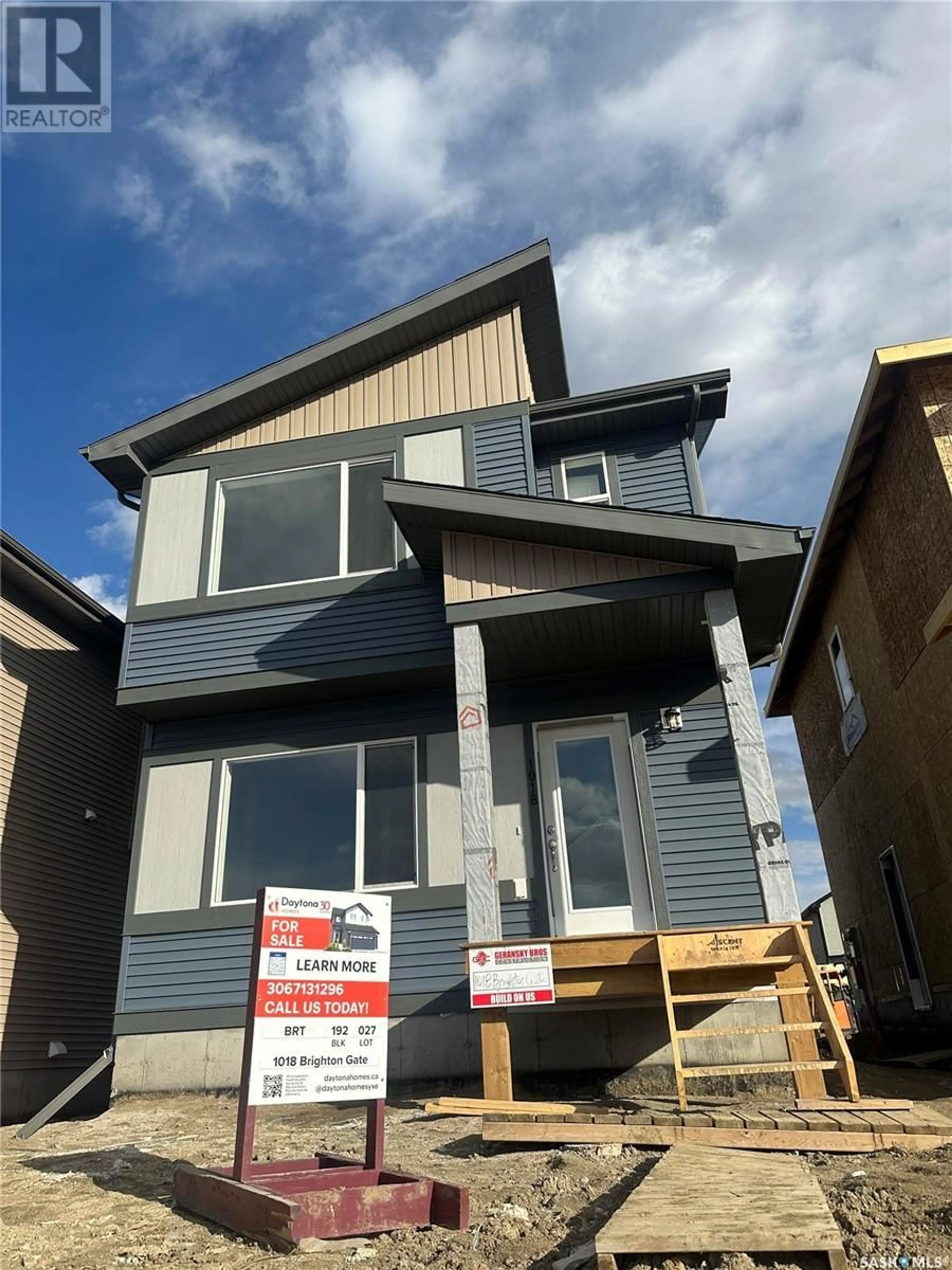 Frontside or backside of a home for 1018 Brighton GATE, Saskatoon Saskatchewan S7V1S6