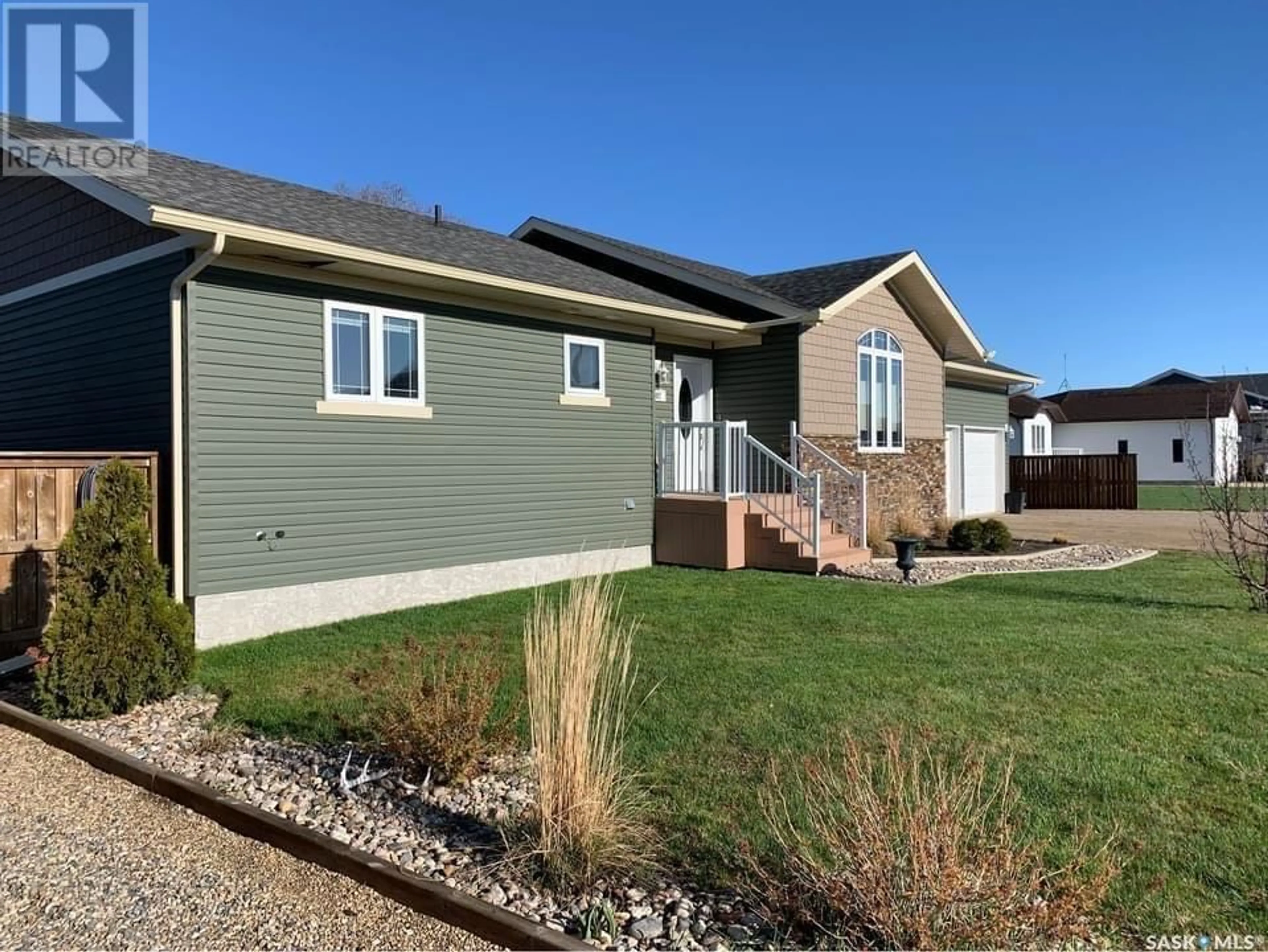 Frontside or backside of a home for 302 Archibald STREET, Midale Saskatchewan S0C1S0