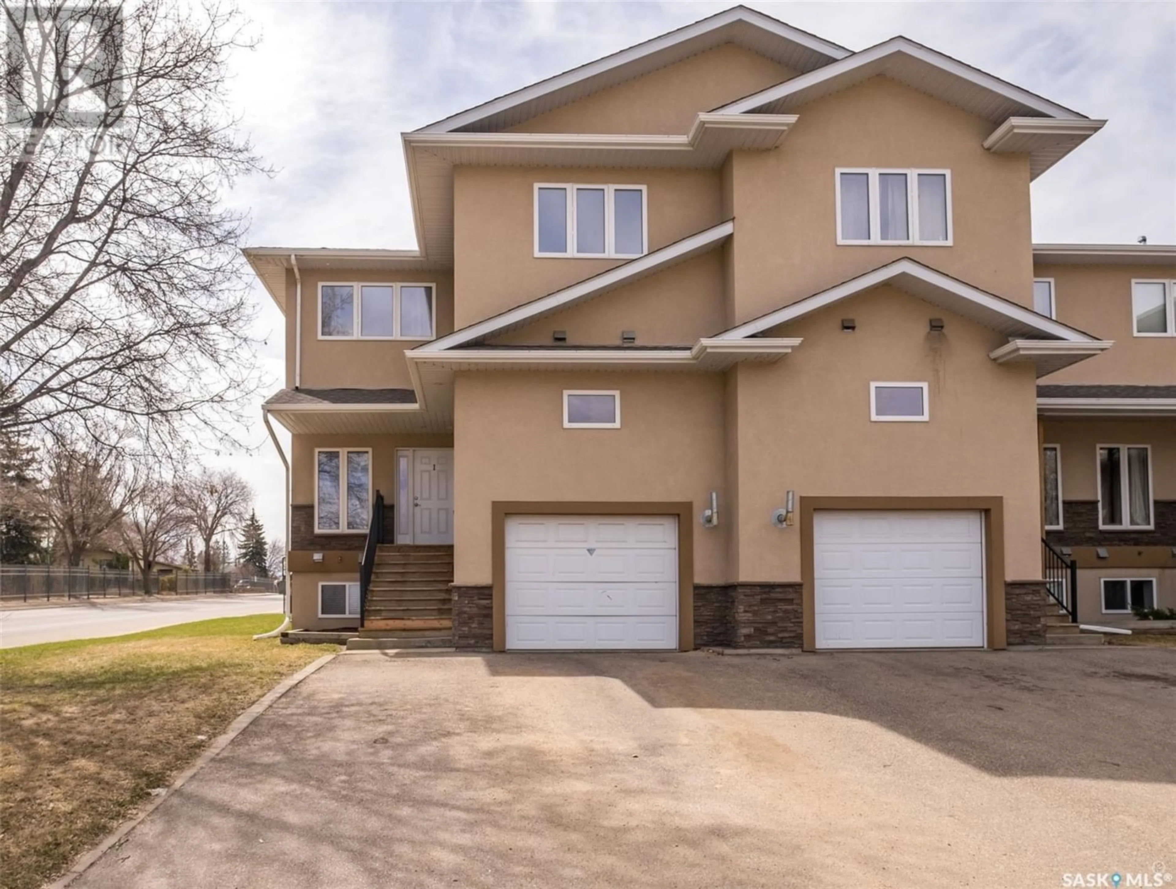 Frontside or backside of a home for 1 211 20th STREET W, Prince Albert Saskatchewan S6V4G5