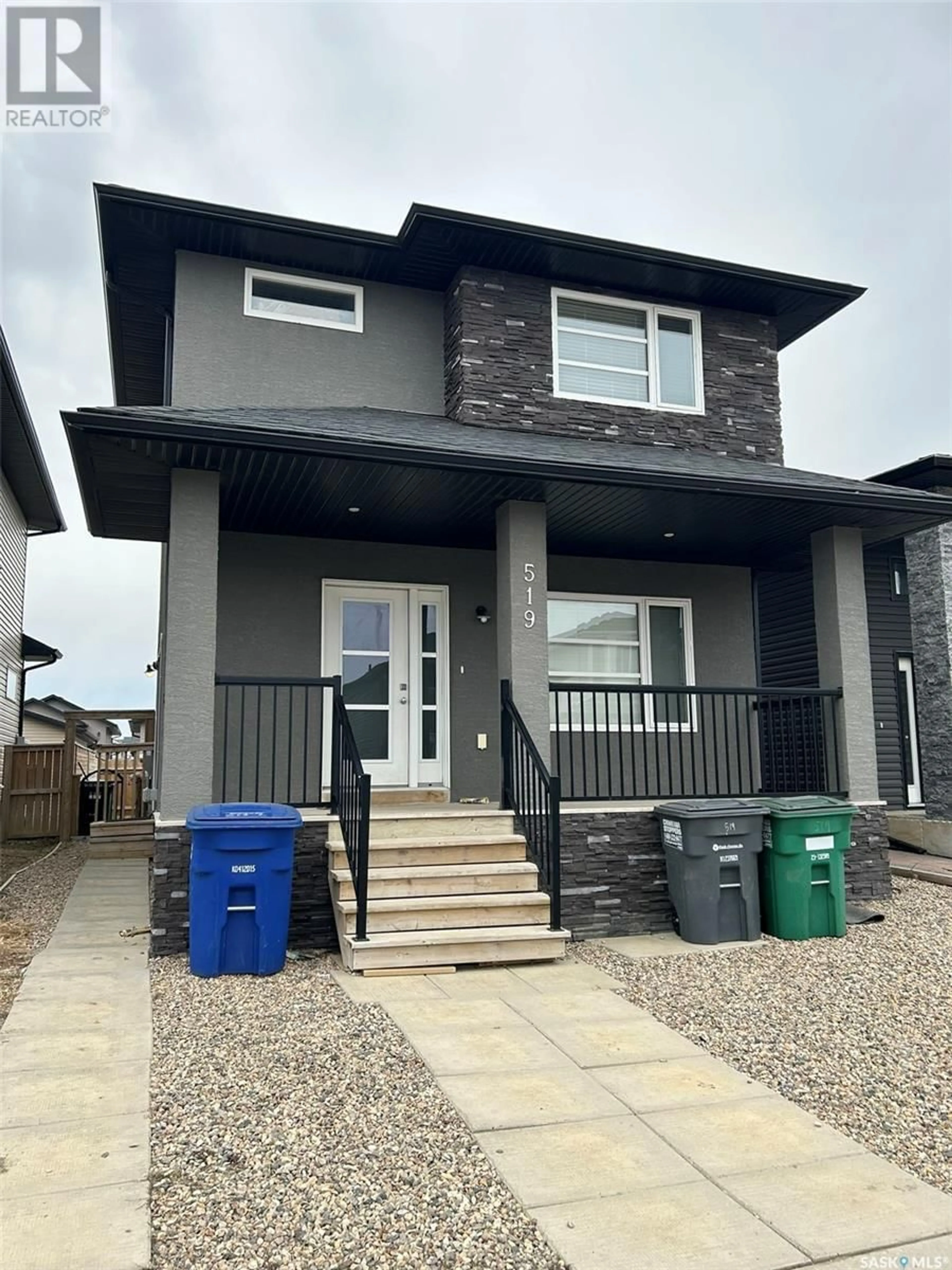 Frontside or backside of a home for 519 Marlatte LANE, Saskatoon Saskatchewan S7W0S9