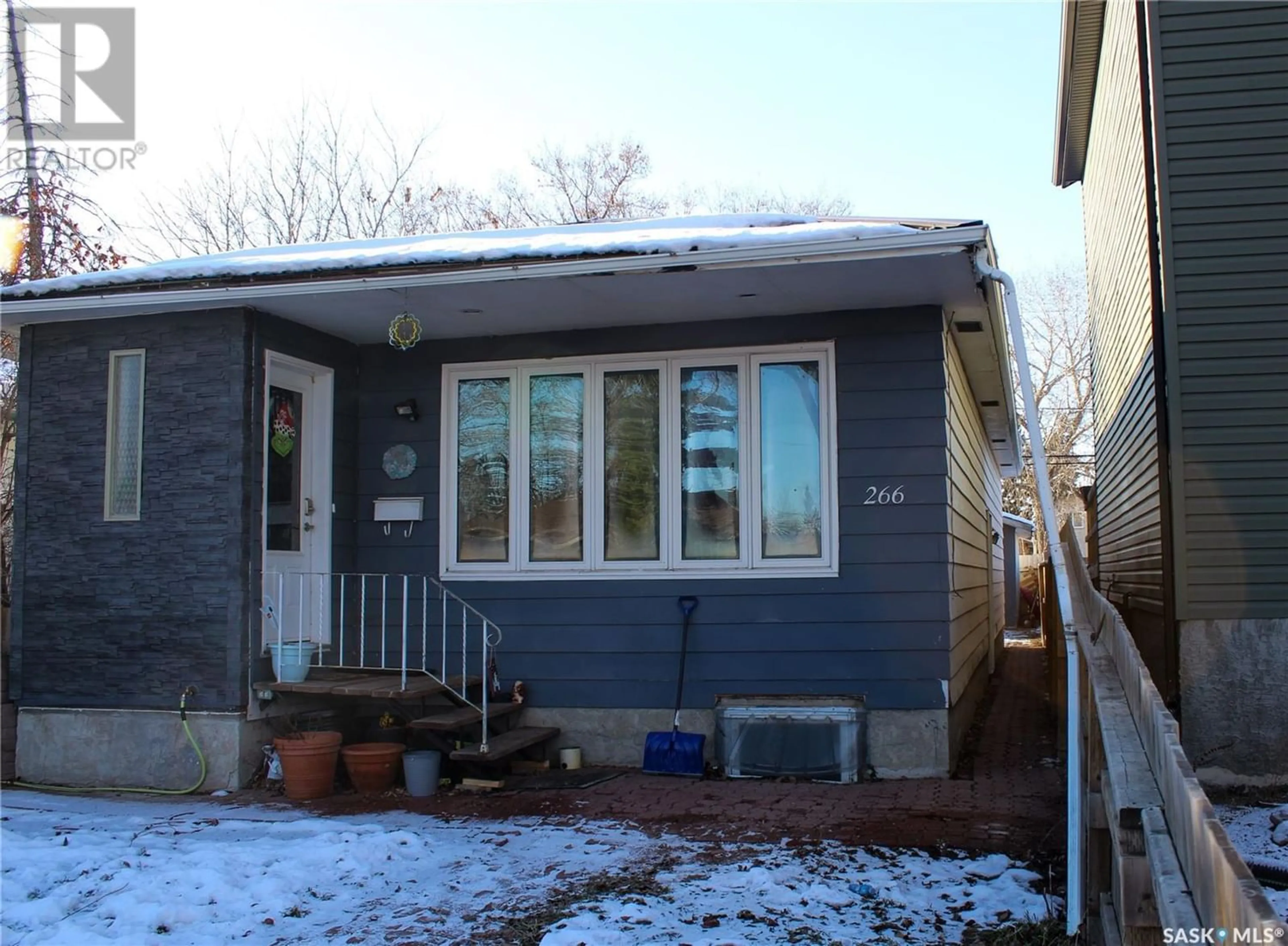 Frontside or backside of a home for 266 St John STREET, Regina Saskatchewan S4R1P9