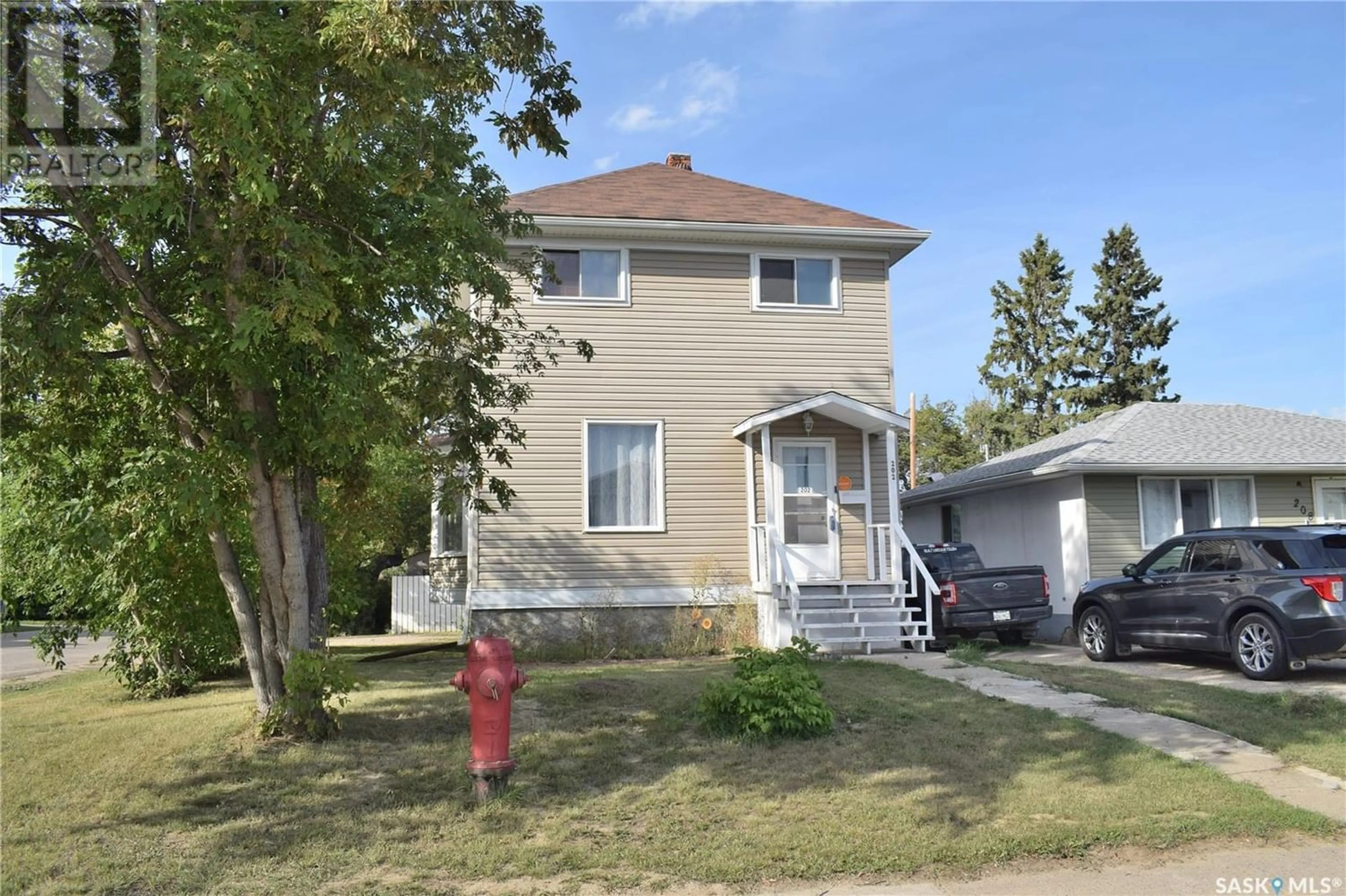 Frontside or backside of a home for 202 26th STREET E, Prince Albert Saskatchewan S6V1T9