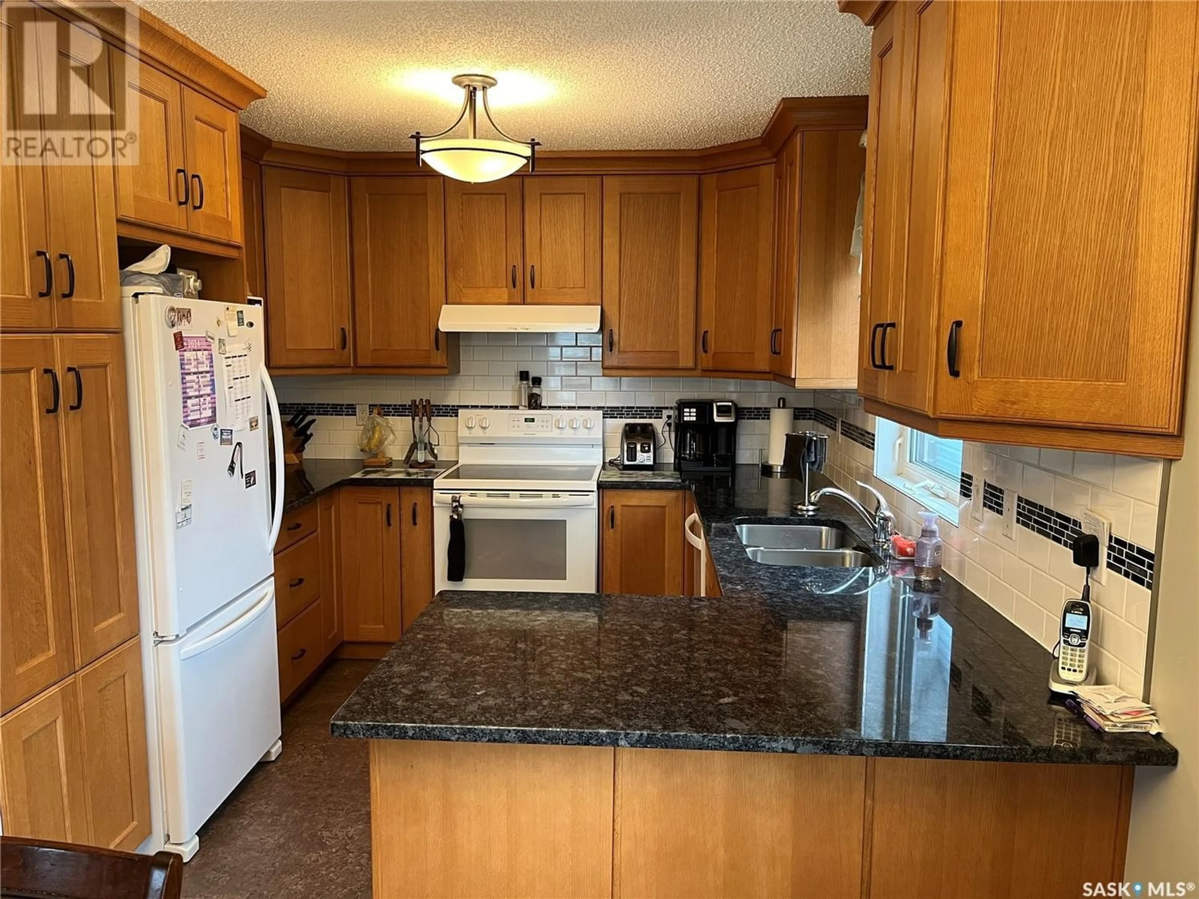 Standard kitchen, wood floors, cottage for 423 Qu'Appelle STREET, Weyburn Saskatchewan S4H0R3