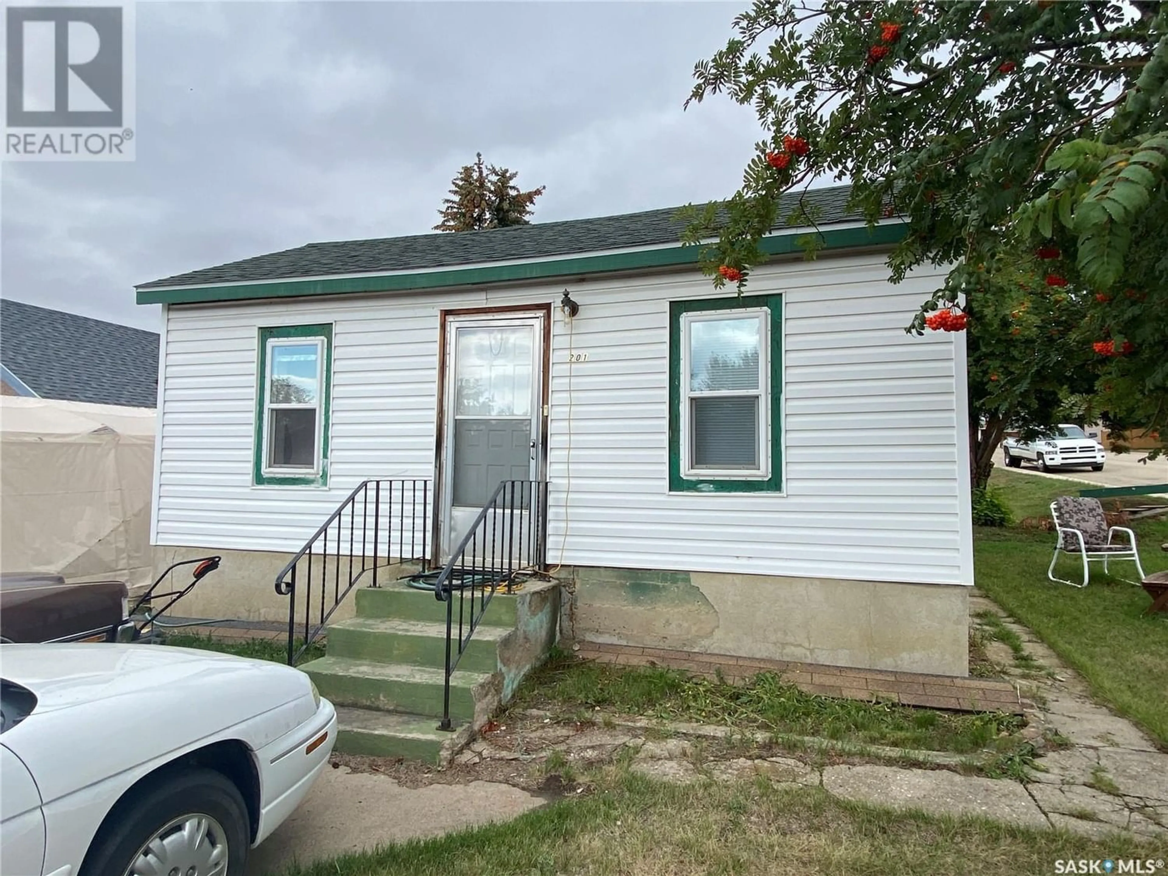 Frontside or backside of a home for 201 6th AVENUE W, Biggar Saskatchewan S0K0M0