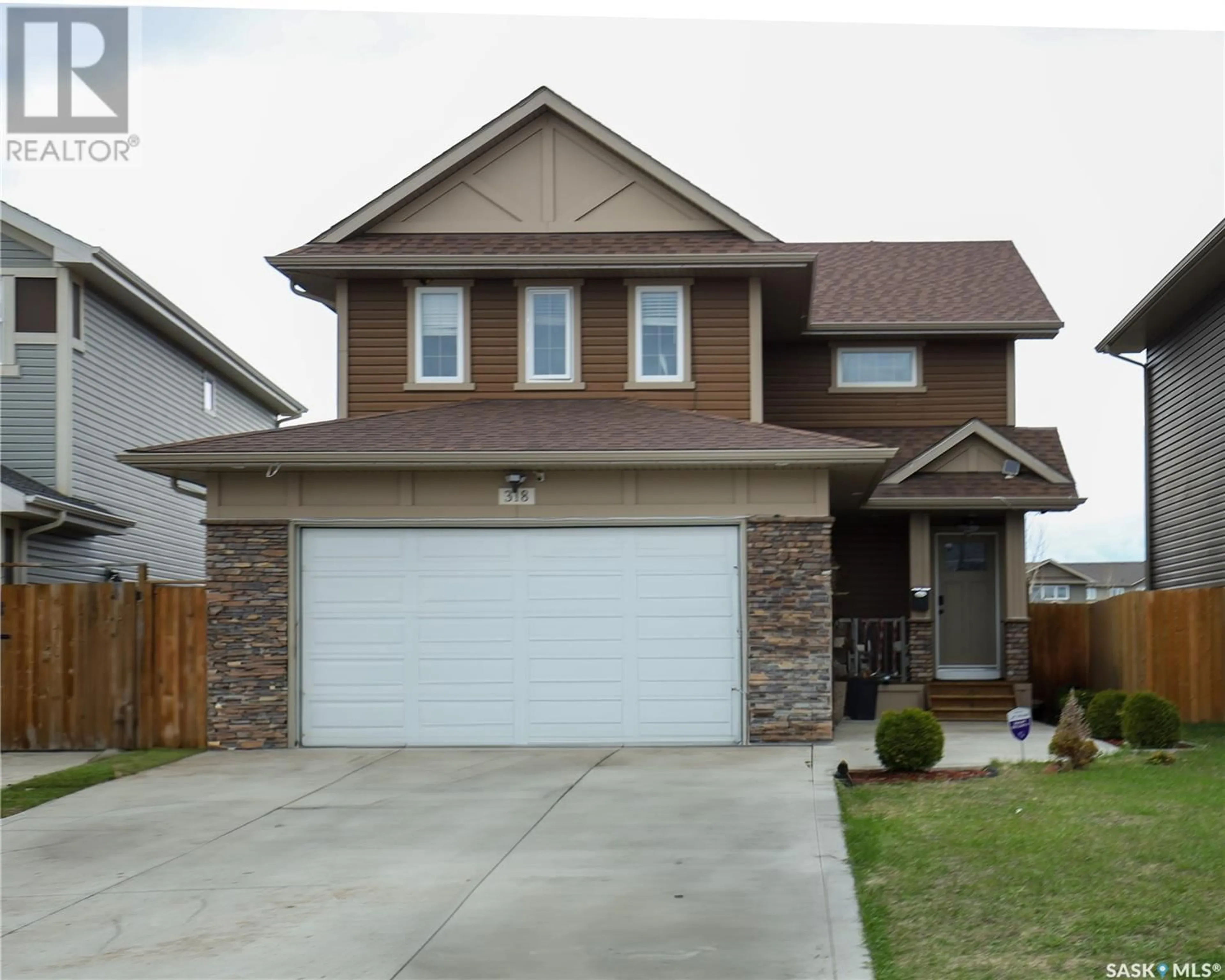 Frontside or backside of a home for 318 Lehrer MANOR, Saskatoon Saskatchewan S7R0L4