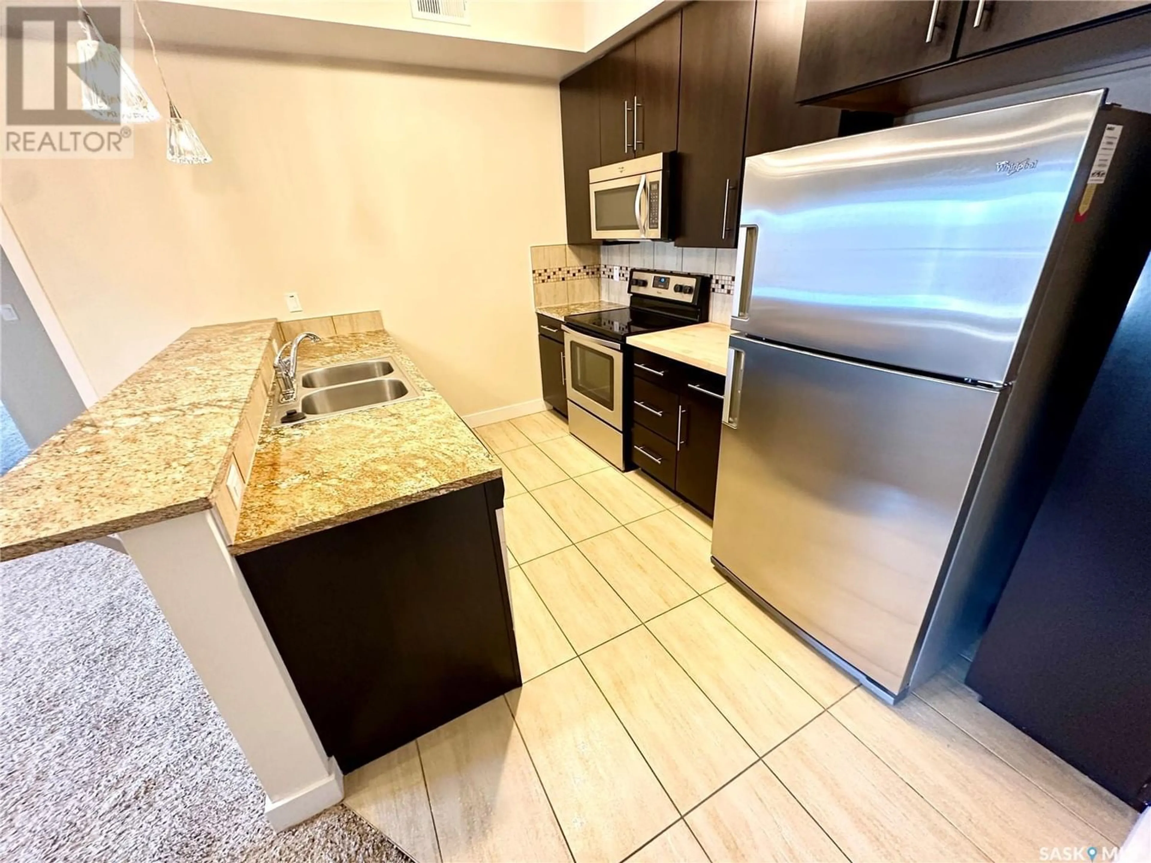 Standard kitchen, ceramic/tile floor for 104 71 Riverwood DRIVE, Weyburn Saskatchewan S4H3P8