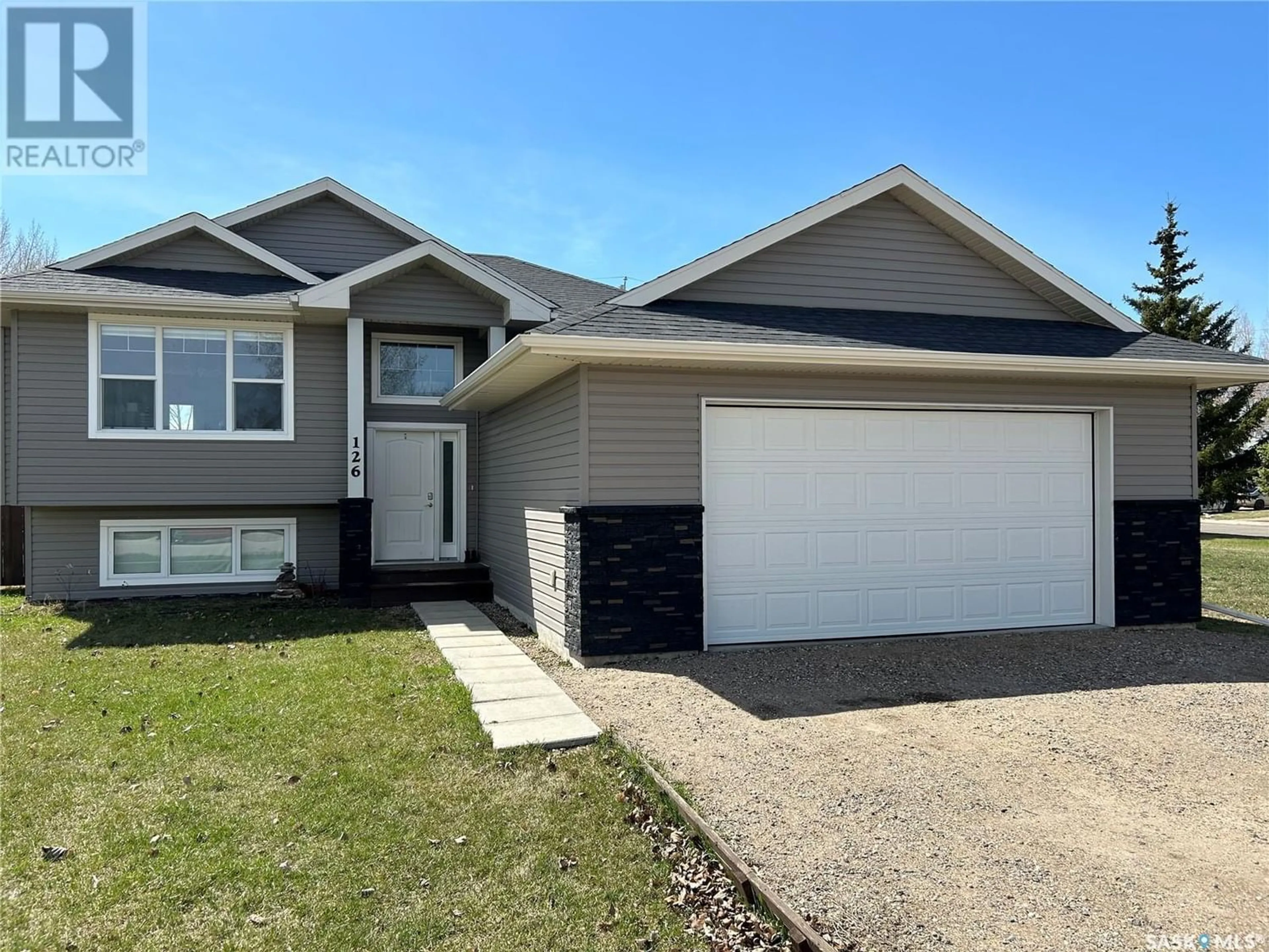 Frontside or backside of a home for 126 Wheatland COURT, Rosthern Saskatchewan S0K3R0