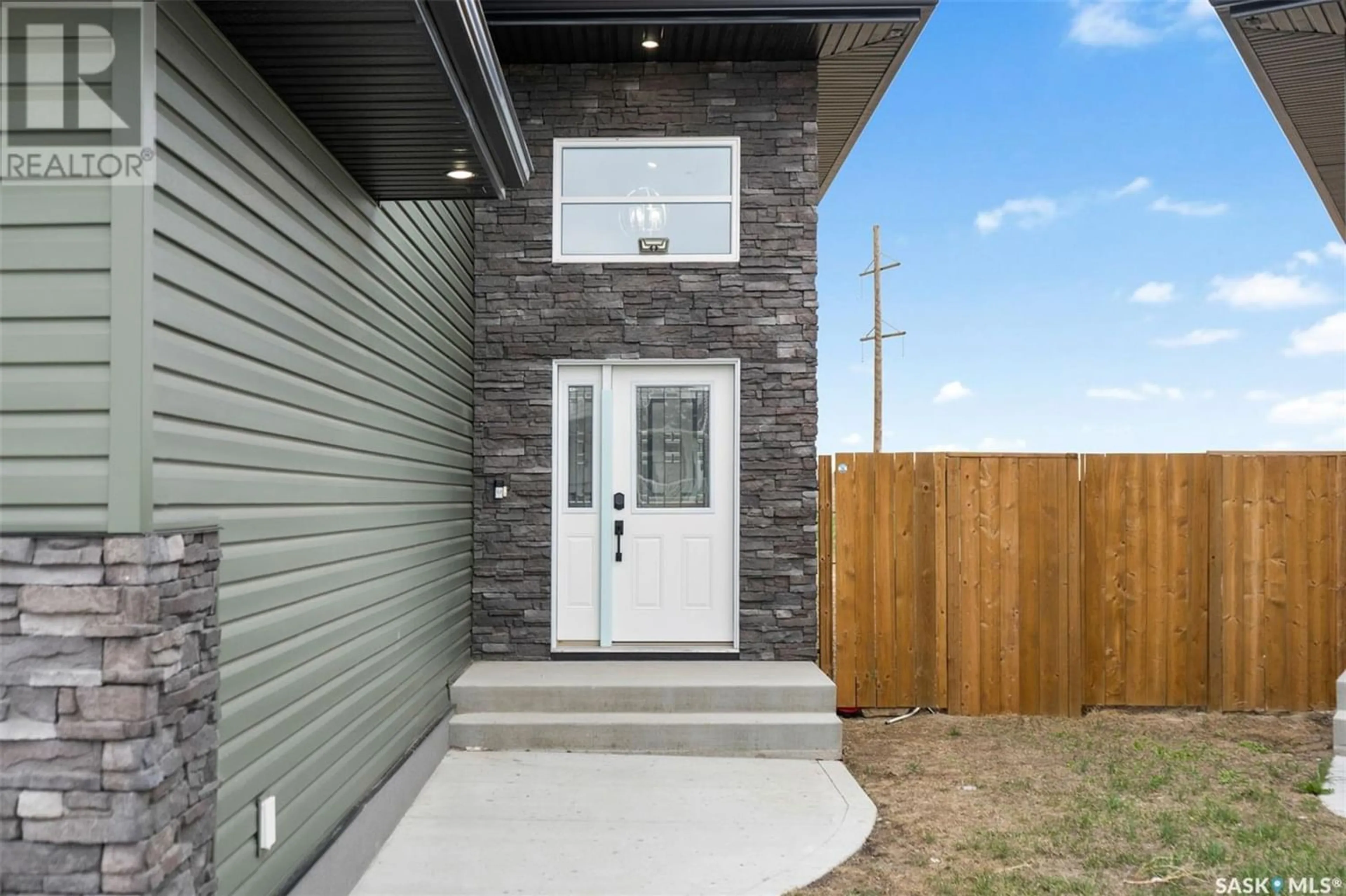 Home with brick exterior material for 535 Ells CRESCENT, Saskatoon Saskatchewan S7L6K8