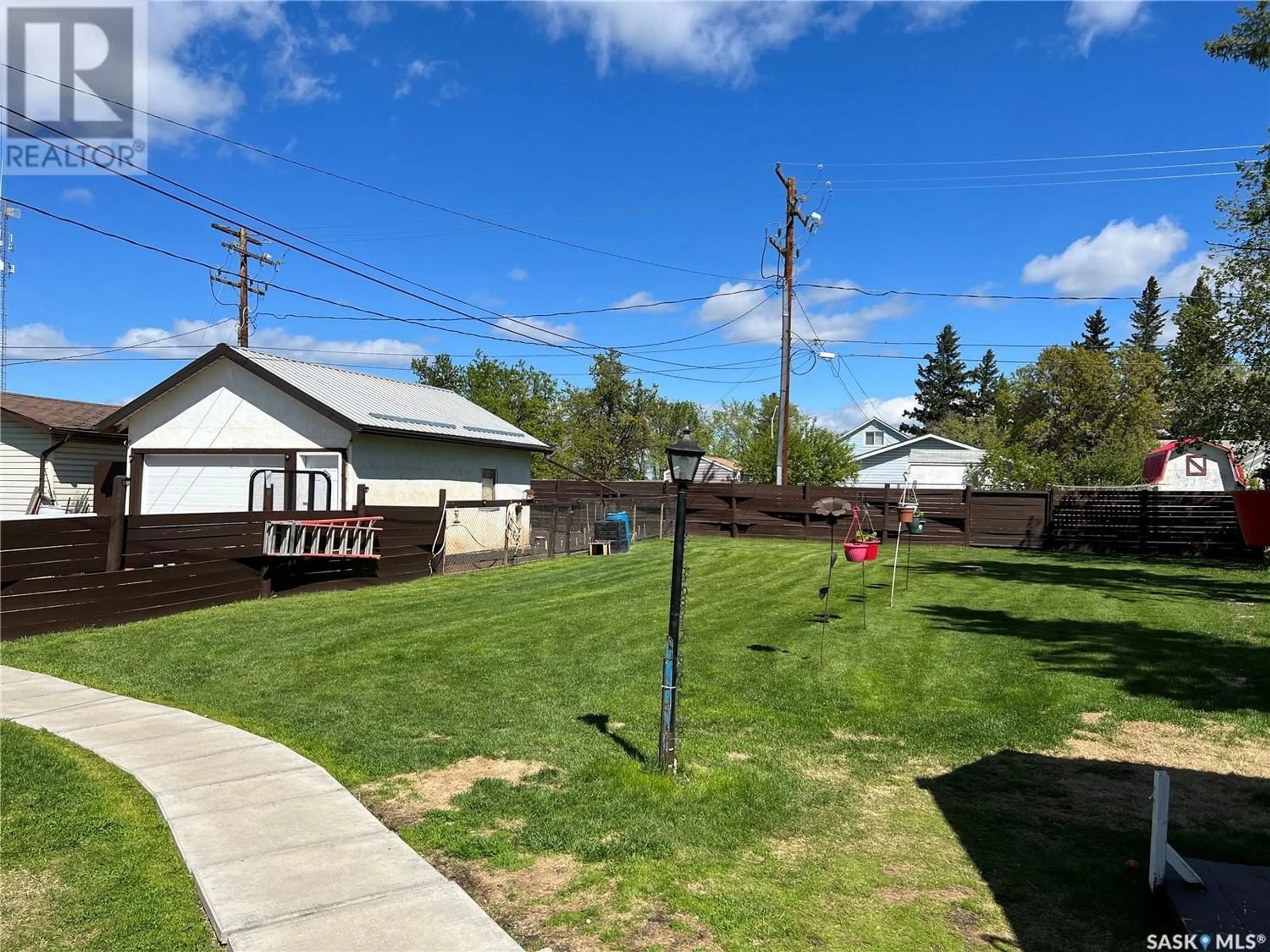 Fenced yard for 104 2nd STREET E, Meadow Lake Saskatchewan S9X1G4