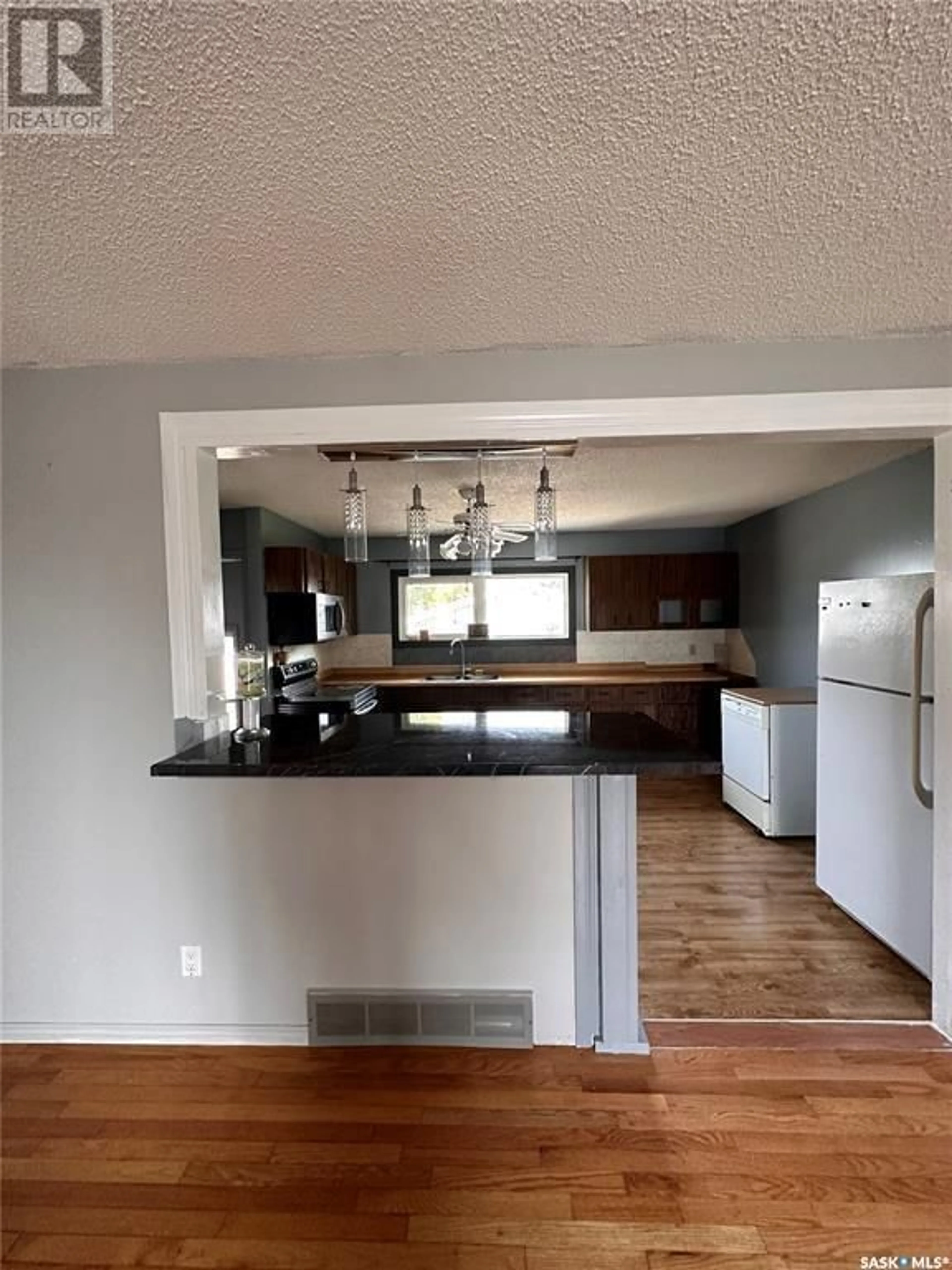 Open concept kitchen for 32 1st AVENUE NW, Preeceville Saskatchewan S0A3B0