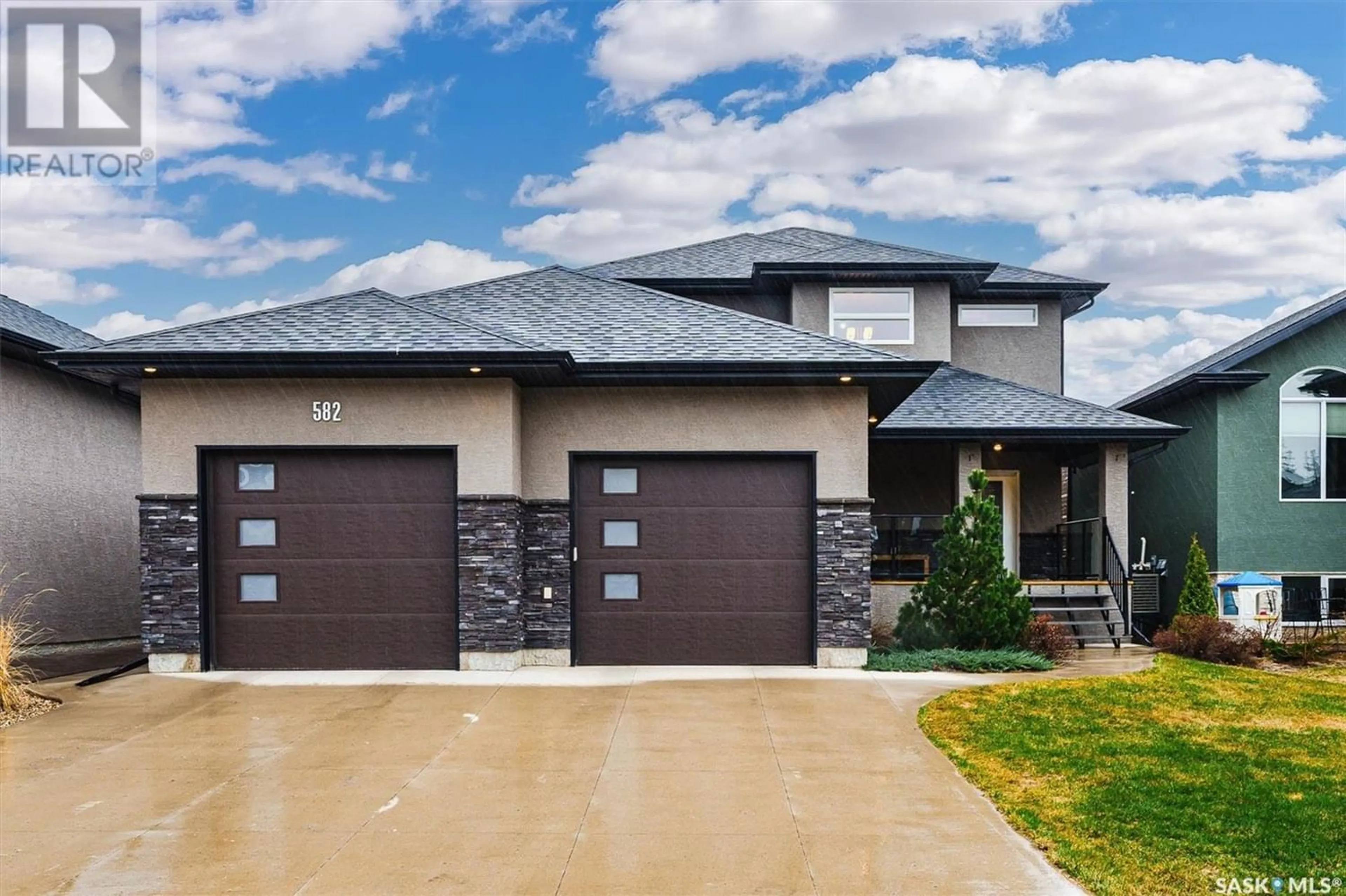 Home with brick exterior material for 582 Atton LANE, Saskatoon Saskatchewan S7W0K6