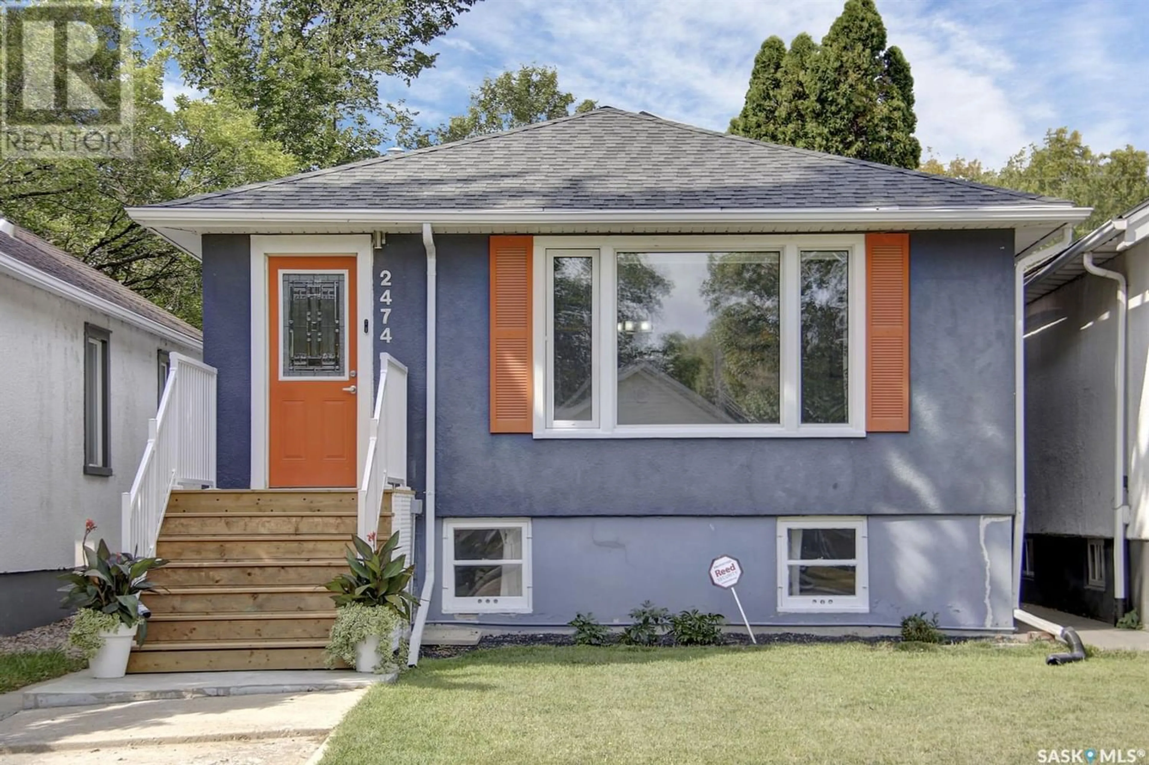Home with vinyl exterior material for 2474 Elliott STREET, Regina Saskatchewan S4N3M3