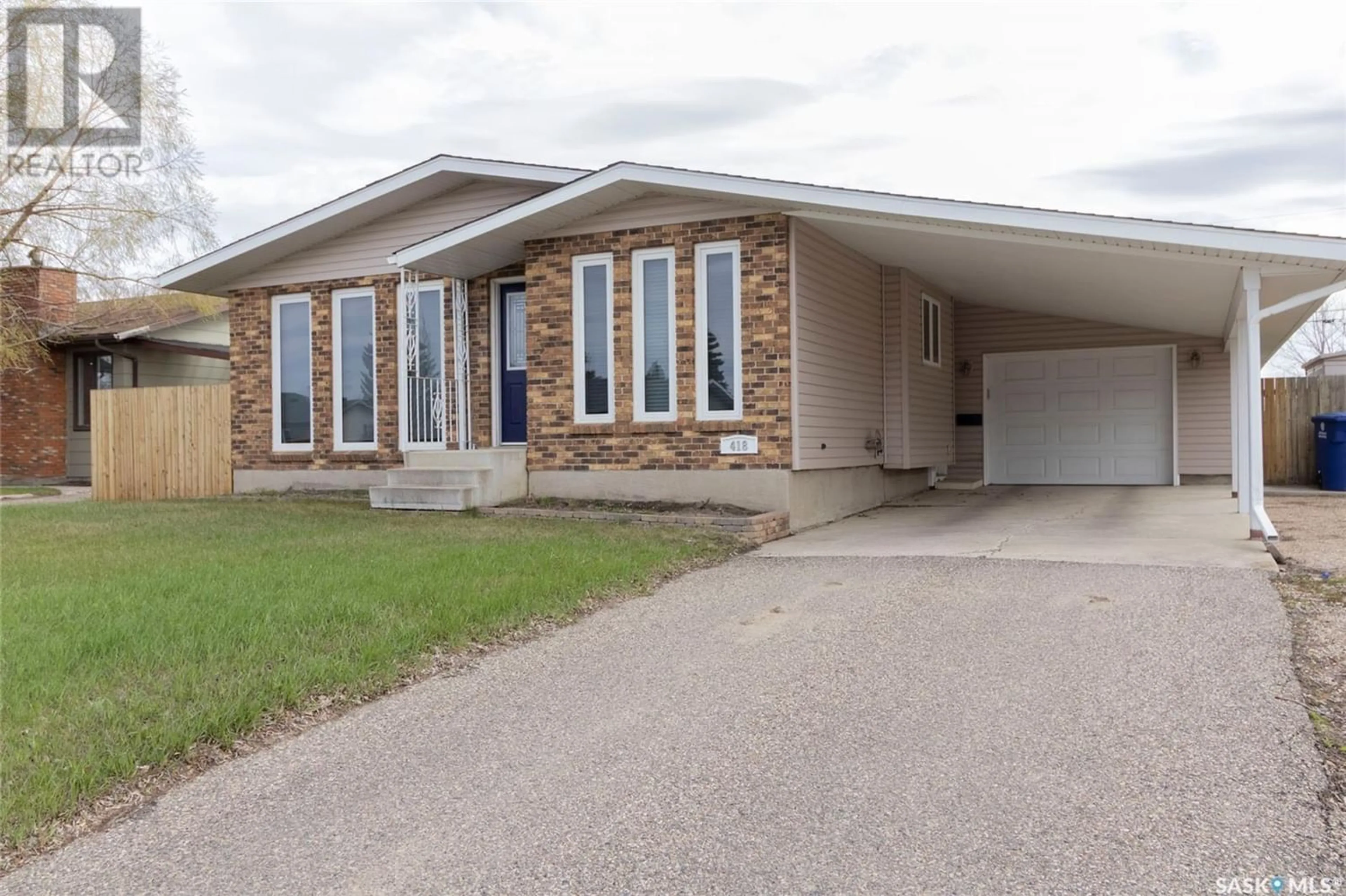 Frontside or backside of a home for 418 4th STREET S, Martensville Saskatchewan S0K2T0