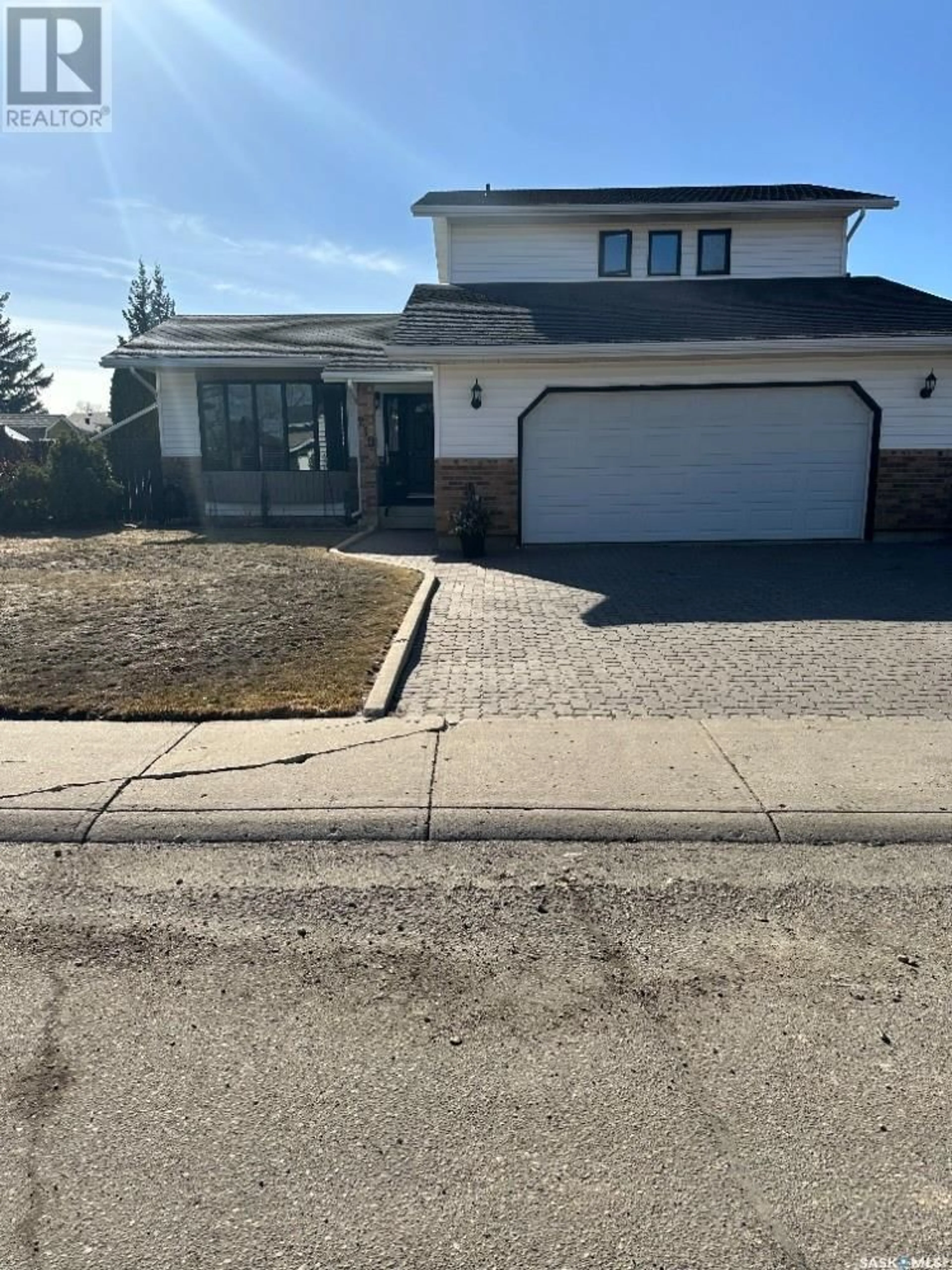 Frontside or backside of a home for 219 FLAVELLE CRESCENT, Saskatoon Saskatchewan S7L6L1