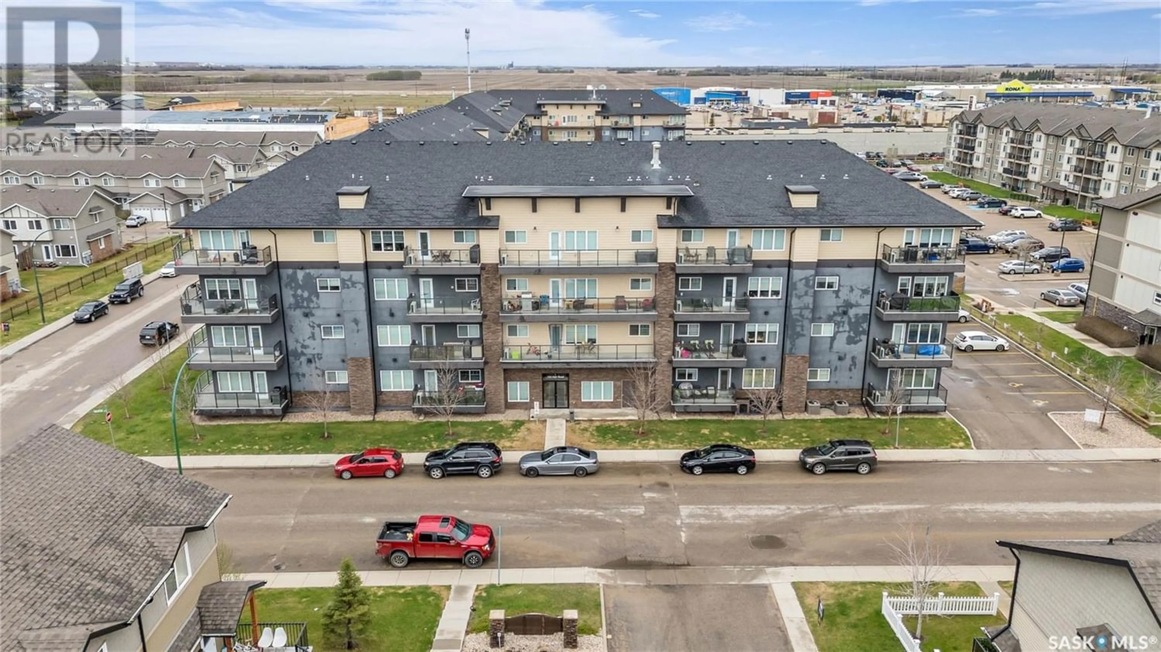 A pic from exterior of the house or condo for 202 702 Hart ROAD, Saskatoon Saskatchewan S7M4P4