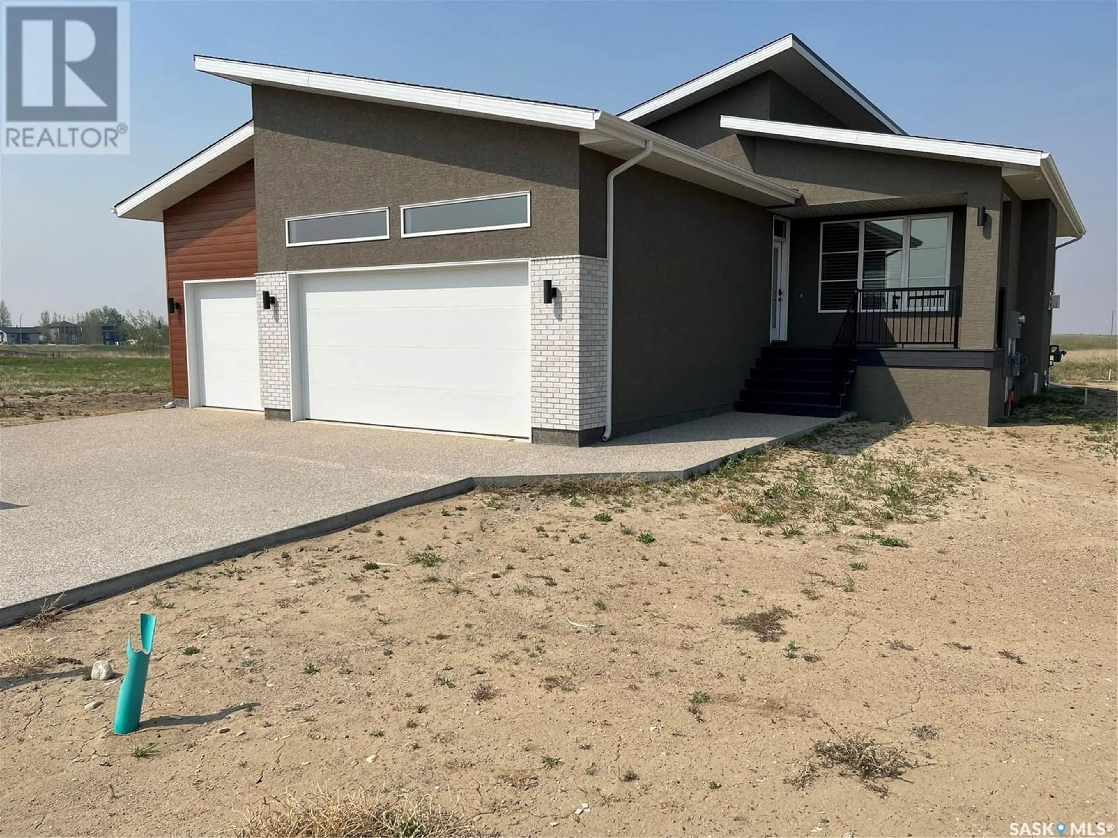 Frontside or backside of a home for 418 Hillside CRESCENT, Pilot Butte Saskatchewan S0G3Z0