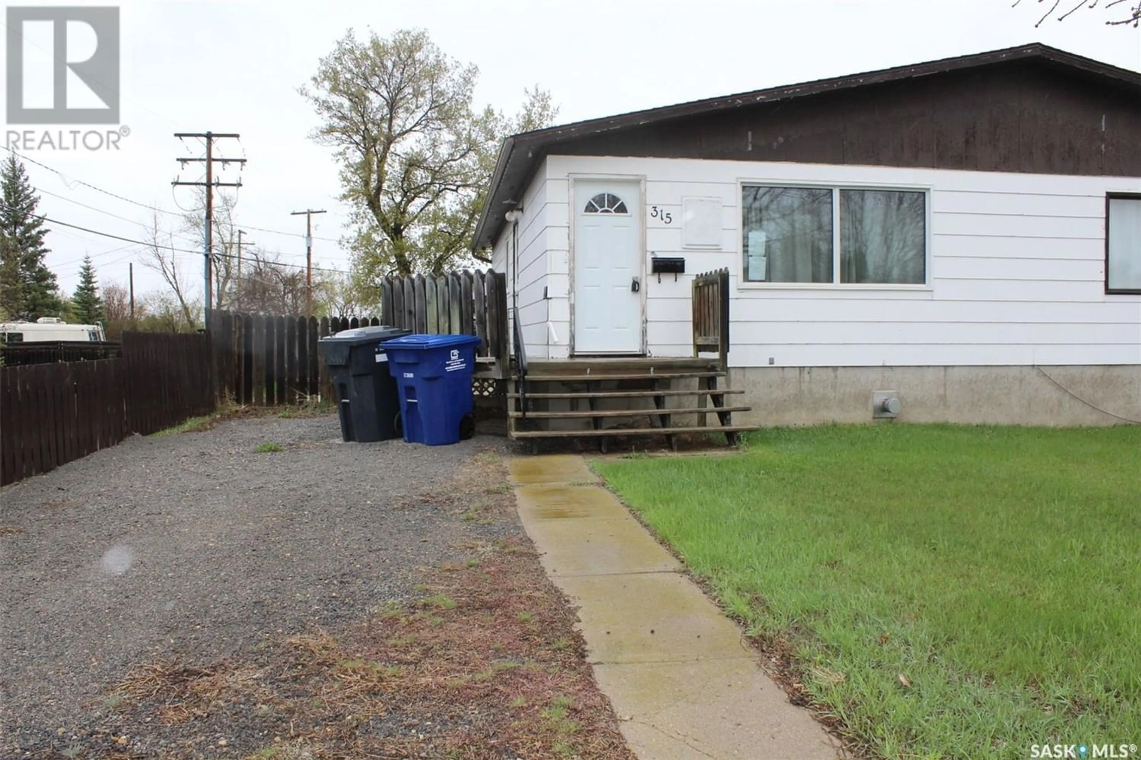 Frontside or backside of a home for 315 7th AVENUE SE, Weyburn Saskatchewan S4H2S8