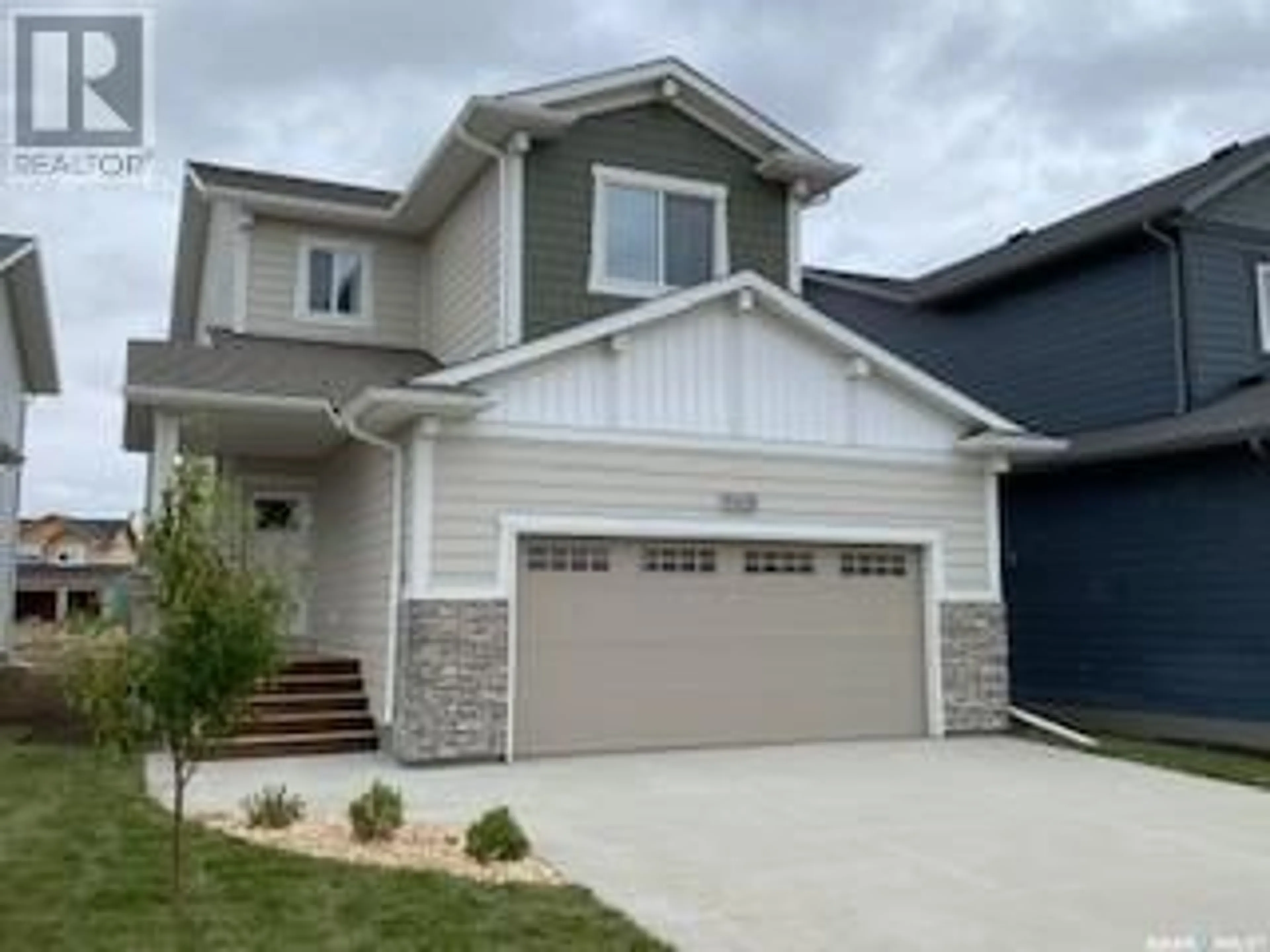 Frontside or backside of a home for 306 Pepper PLACE, Saskatoon Saskatchewan S7V1S7