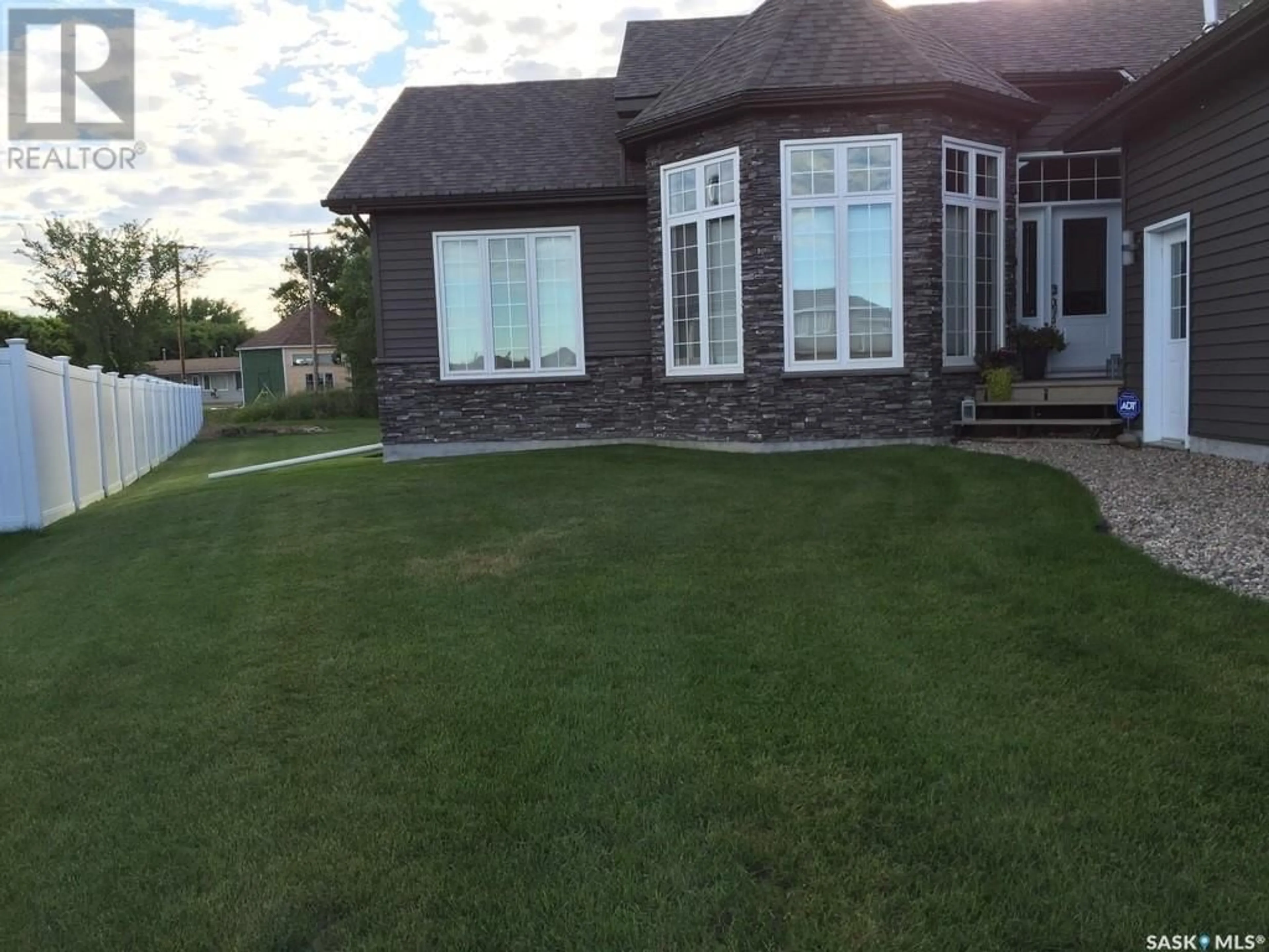 Frontside or backside of a home for 3 Cedar PLACE, Outlook Saskatchewan S0L2N0