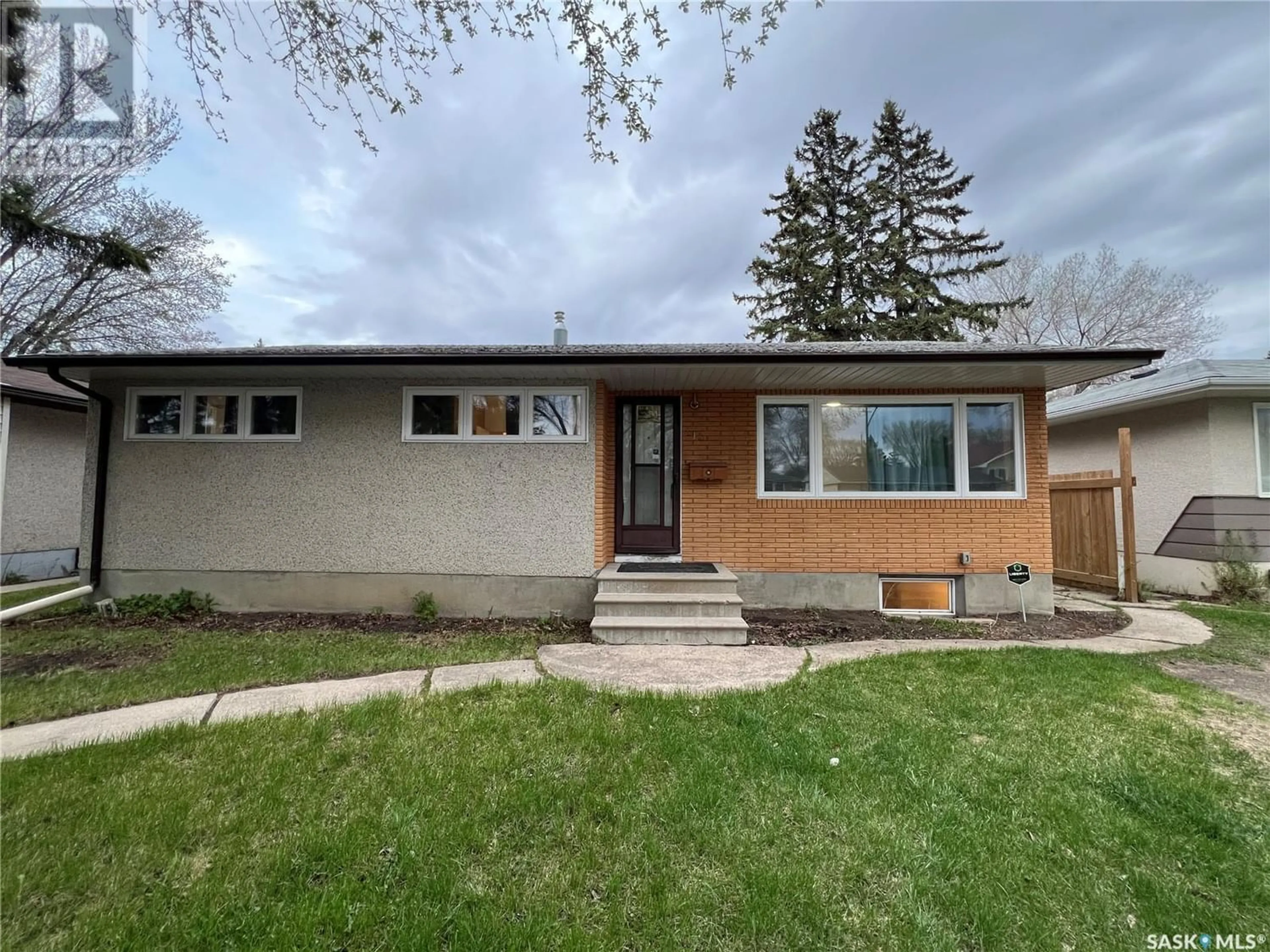 Frontside or backside of a home for 414 Y AVENUE S, Saskatoon Saskatchewan S7M3J9