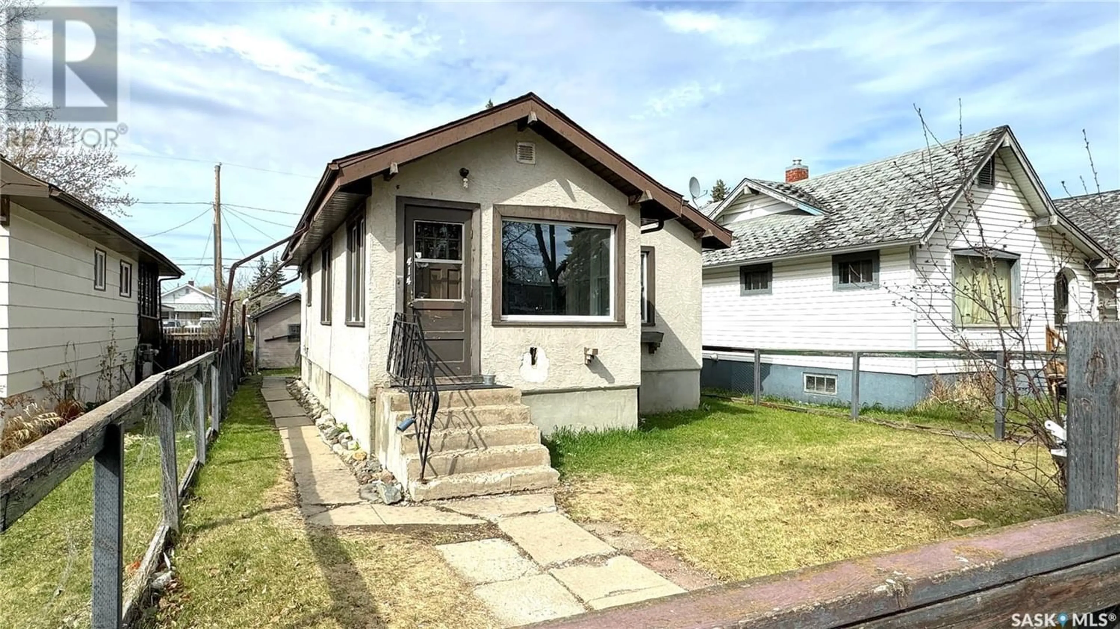 Frontside or backside of a home for 414 9th STREET E, Prince Albert Saskatchewan S6V0Y2