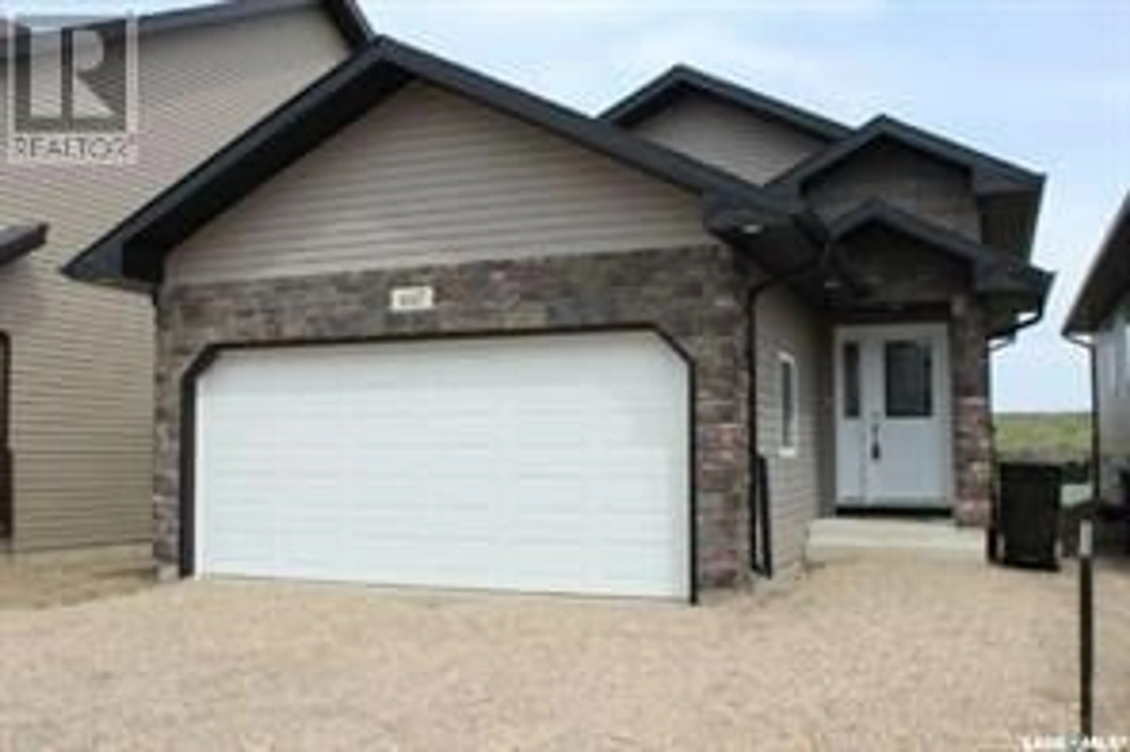 Frontside or backside of a home for 447 Henick CRESCENT, Saskatoon Saskatchewan S7R0J4