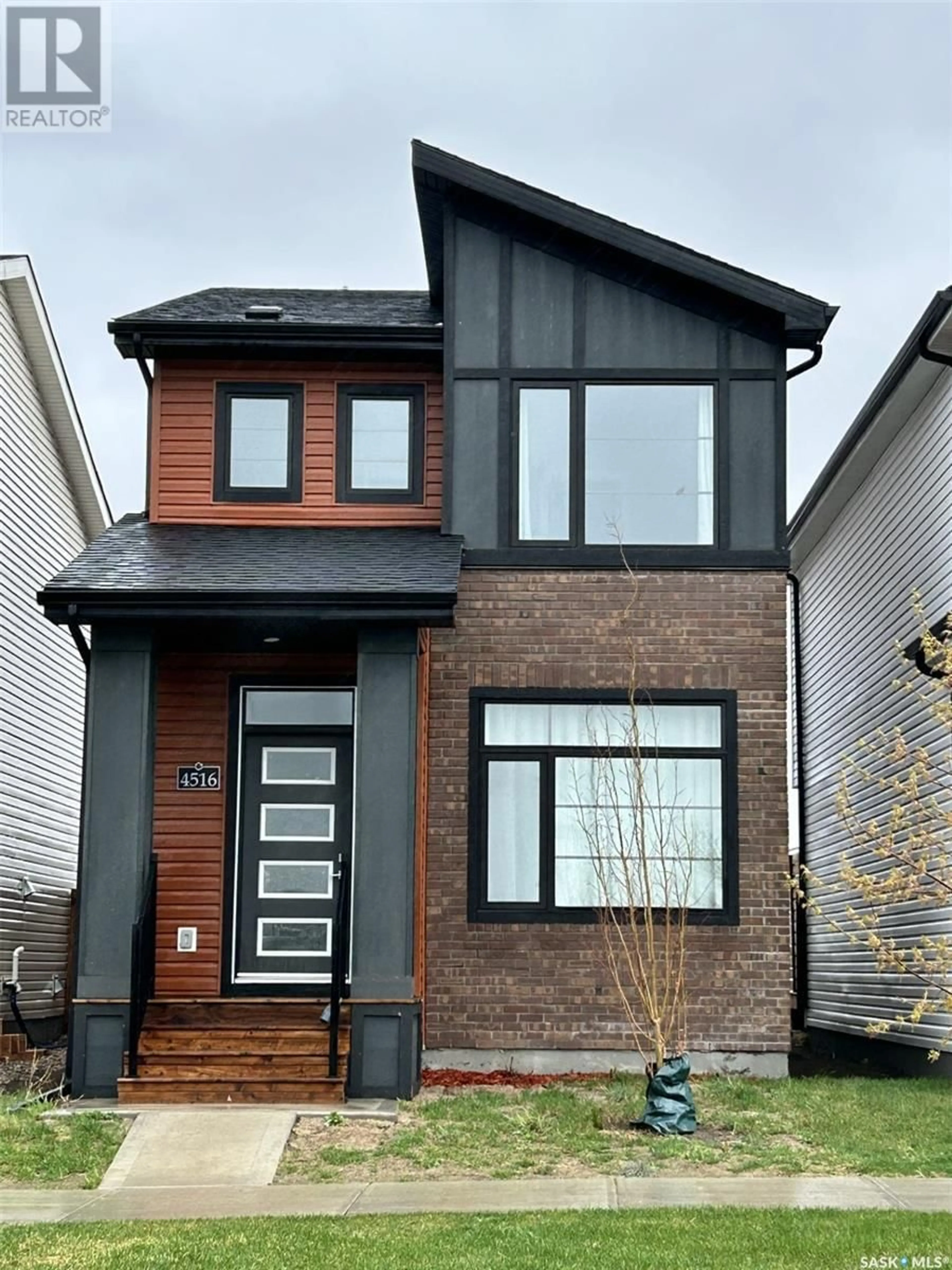 Home with brick exterior material for 4516 Buckingham DRIVE, Regina Saskatchewan S4V1P4