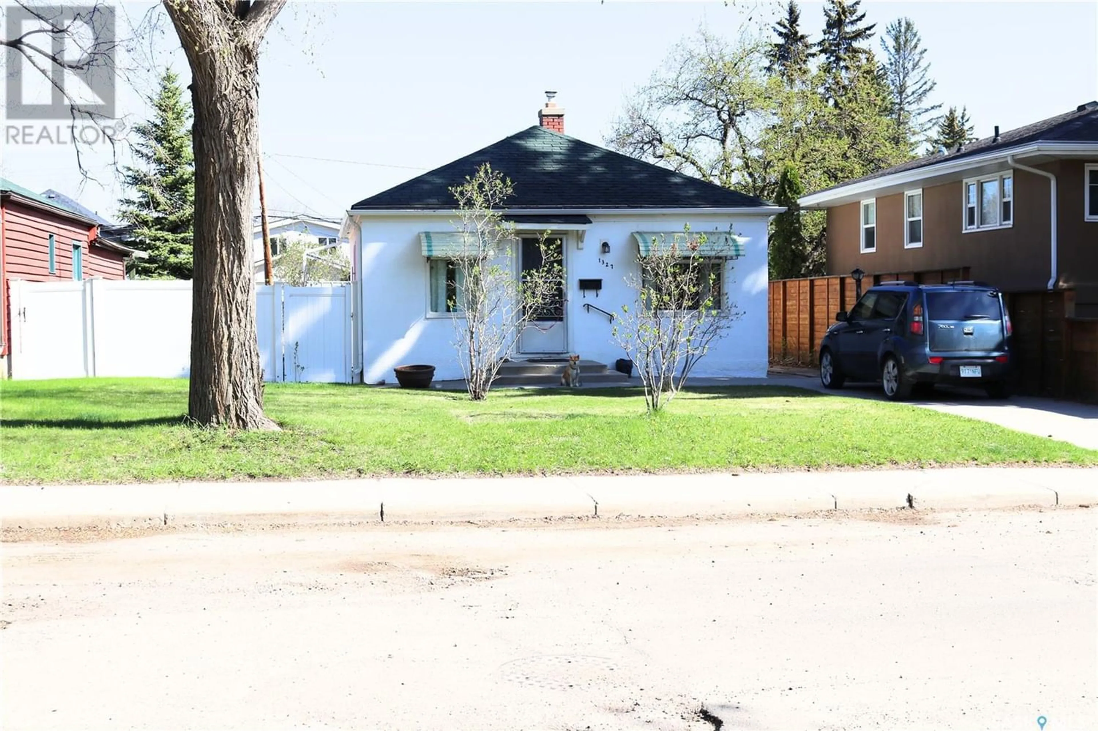 Frontside or backside of a home for 1327 15th STREET E, Saskatoon Saskatchewan S7N0R8