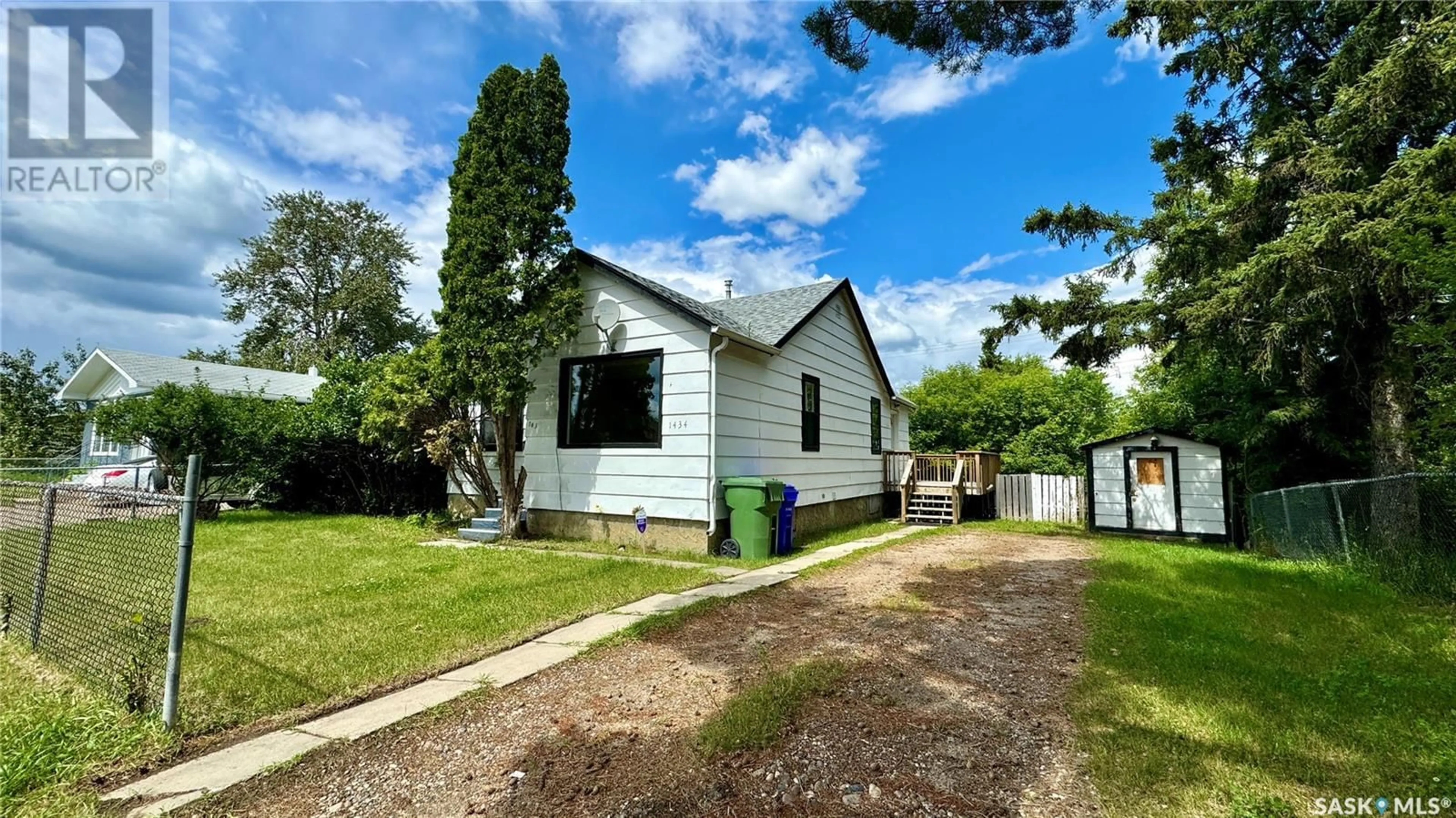 A pic from outside/outdoor area/front of a property/back of a property/a pic from drone, street for 1434 13TH STREET, Prince Albert Saskatchewan S6V3J5