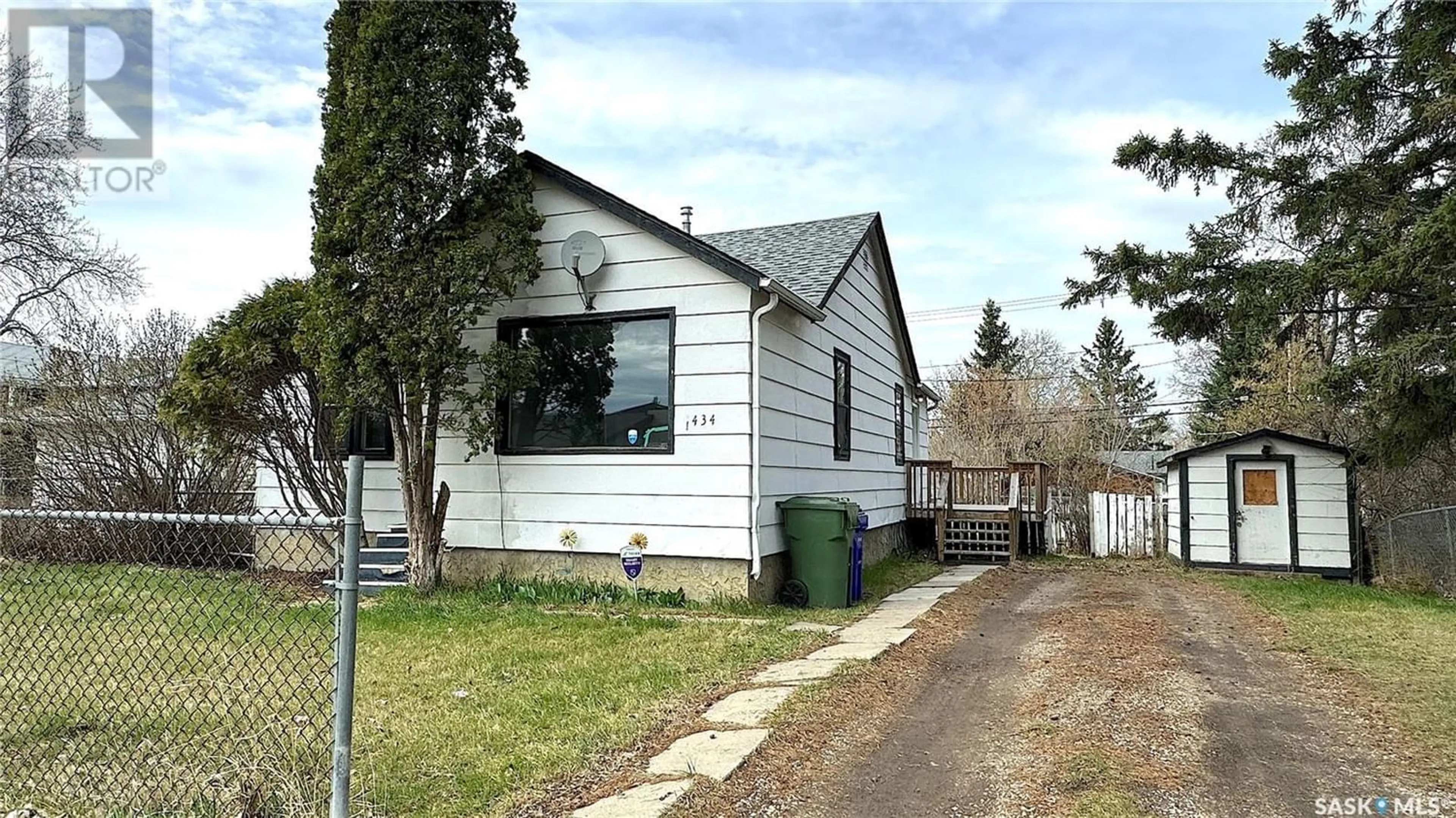 Frontside or backside of a home for 1434 13th STREET W, Prince Albert Saskatchewan S6V3J5