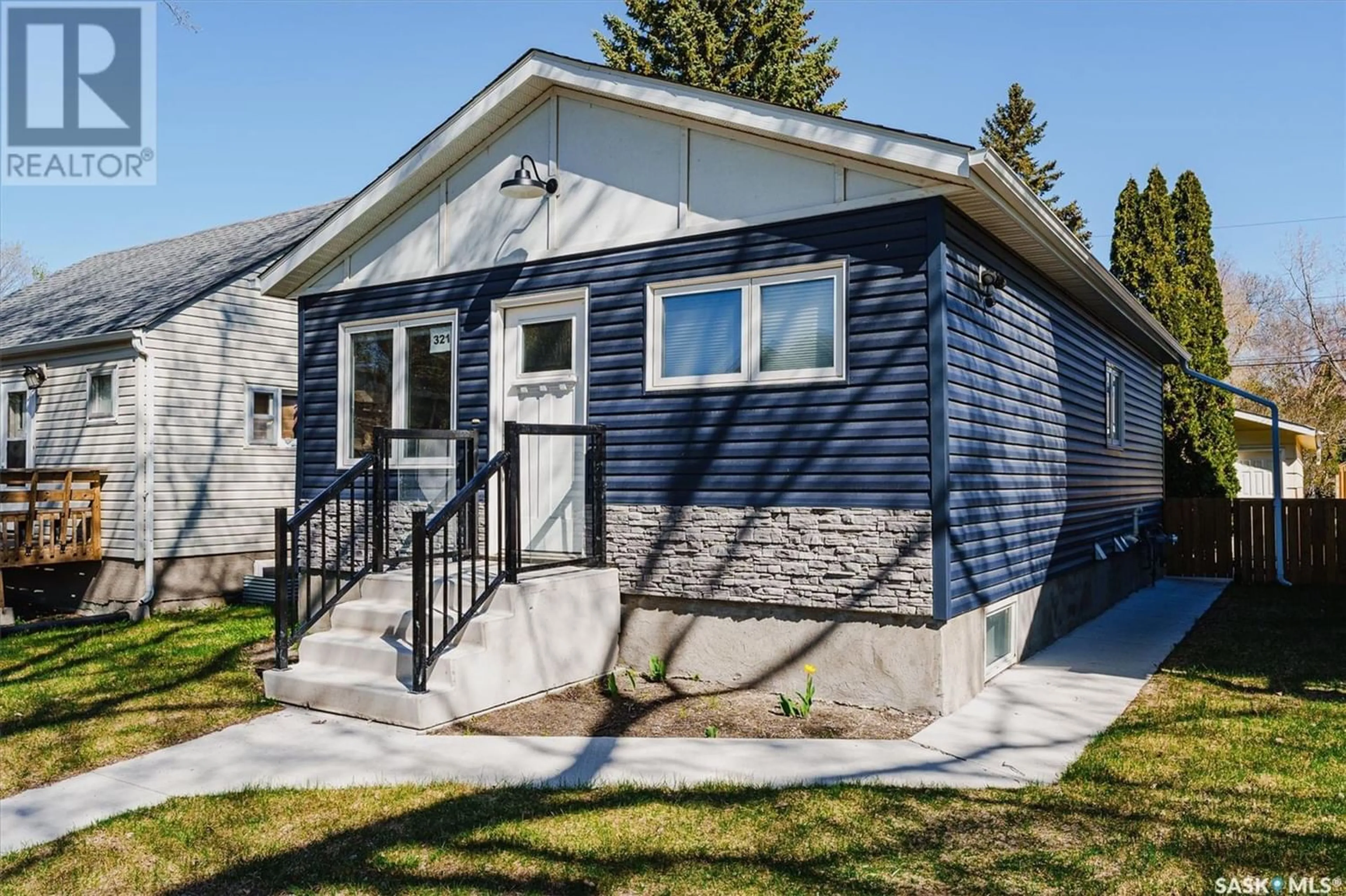 Home with vinyl exterior material for 321 3rd STREET E, Saskatoon Saskatchewan S7H1L4