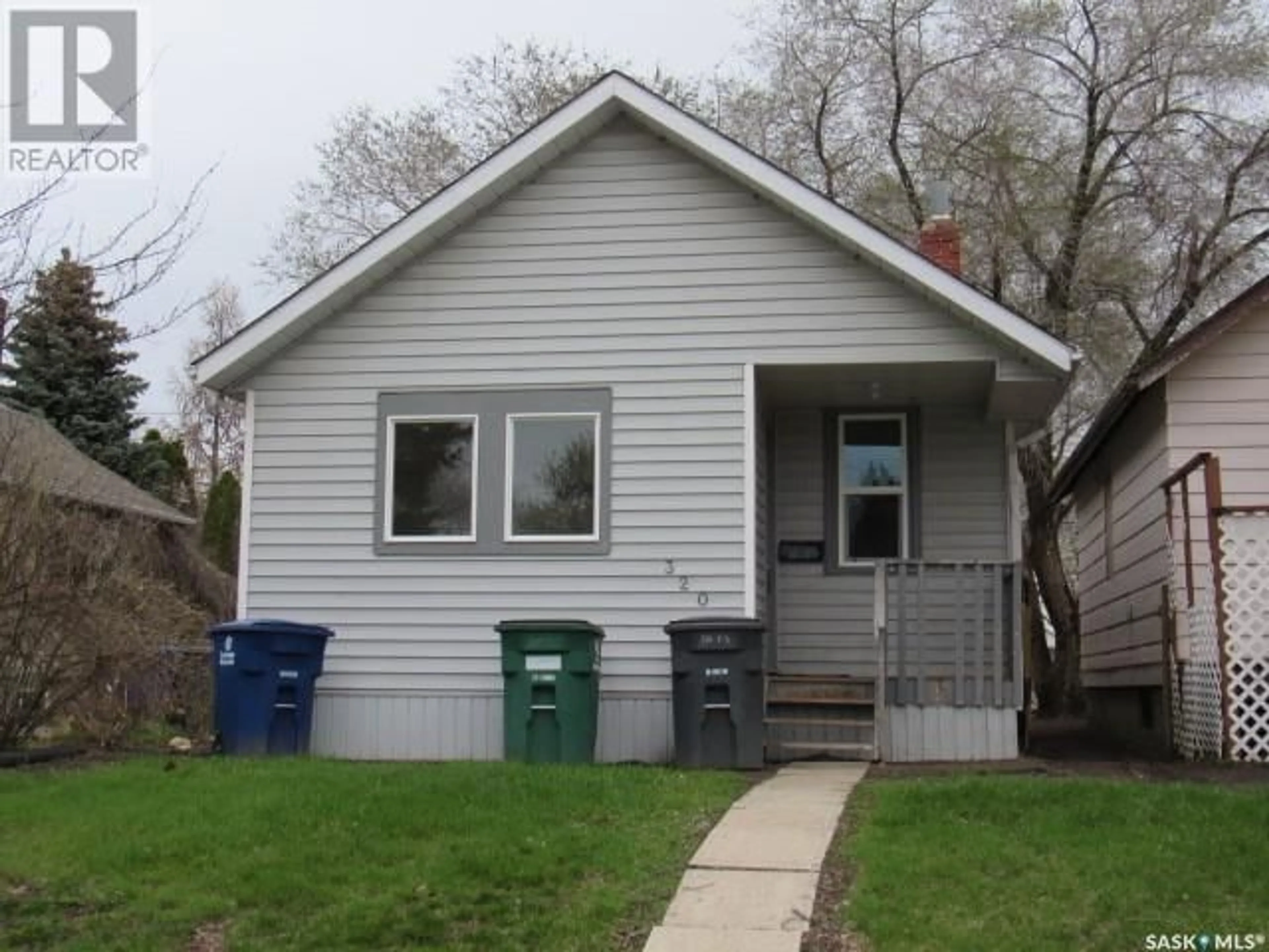 Frontside or backside of a home for 320 V AVENUE S, Saskatoon Saskatchewan S7M3E5