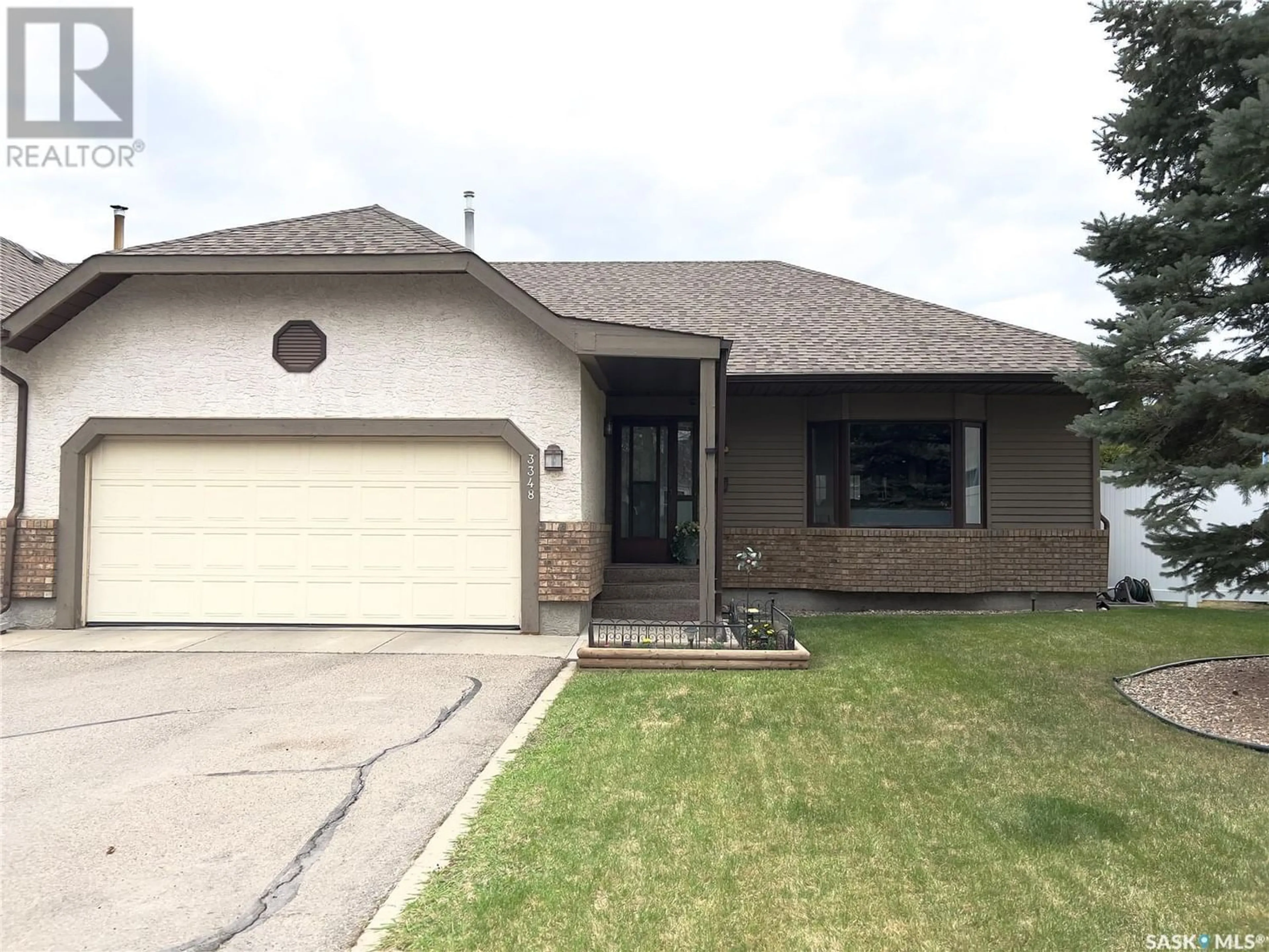 Frontside or backside of a home for 3348 WOODHAMS DRIVE E, Regina Saskatchewan S4V2R1